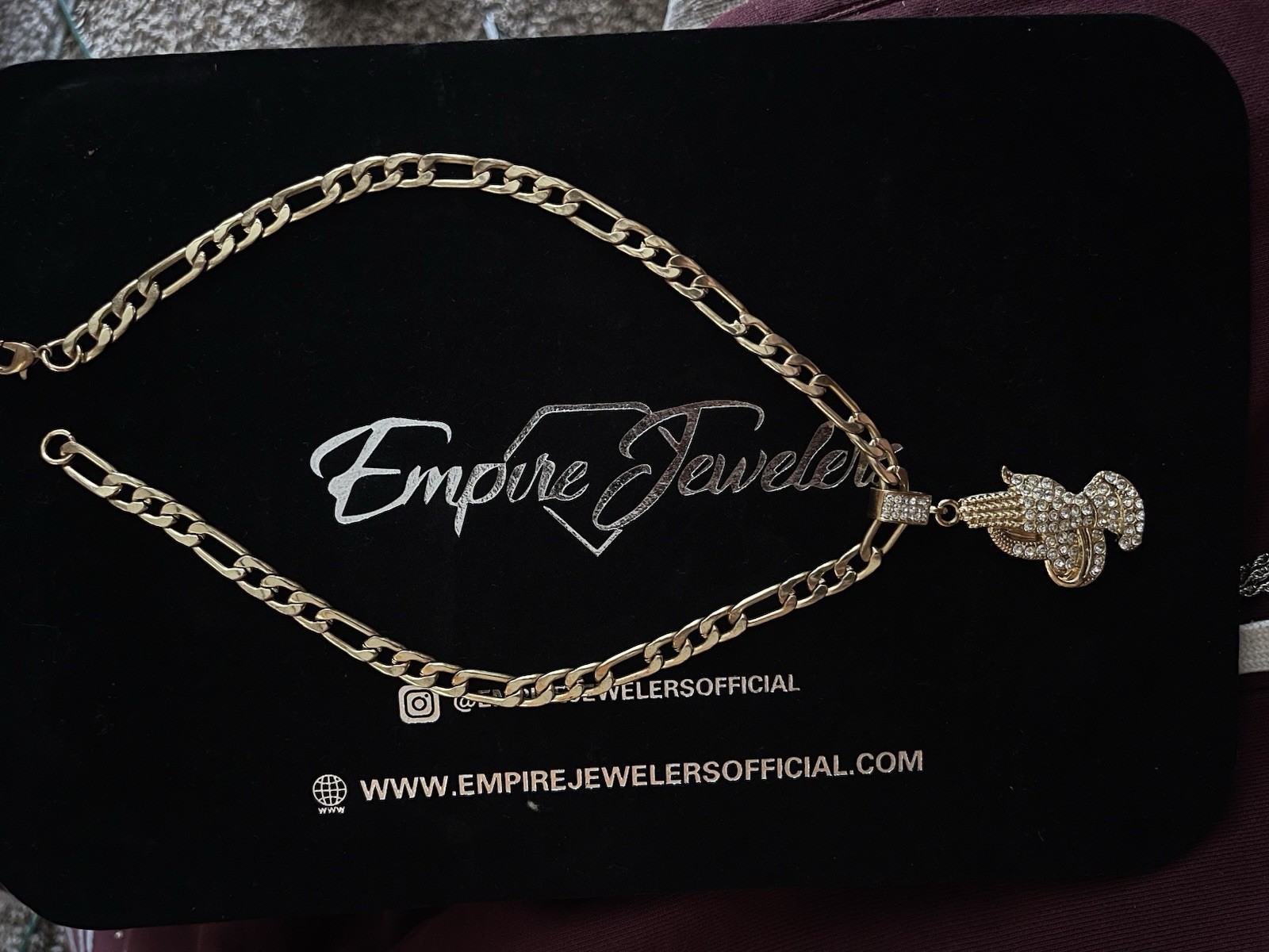 Empire Jewelers Gold Tone Figaro Chain Necklace Hand Charm Pendant Crystal