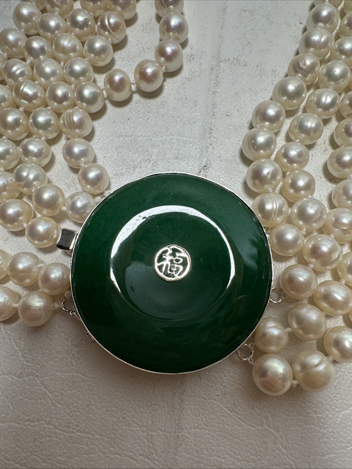 Chinese Natural Pearl Necklace, 925 Silver and a Green Stone In The Middle