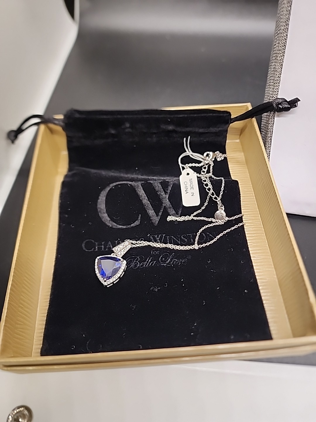 Blue Trillion Cut CZ Pendant w/ White Sapphire Accents
