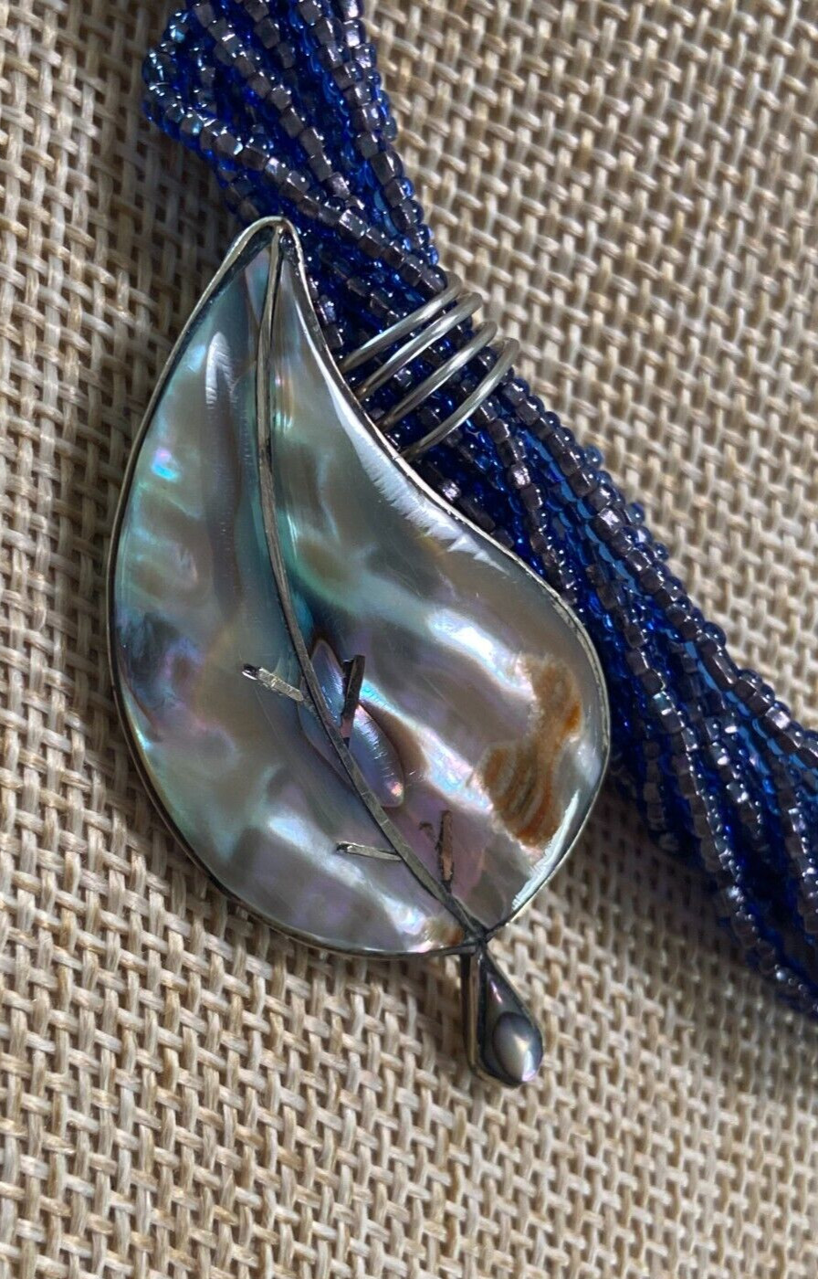 African Glass Bead Necklace with Vintage Silver and Seashell Pendant