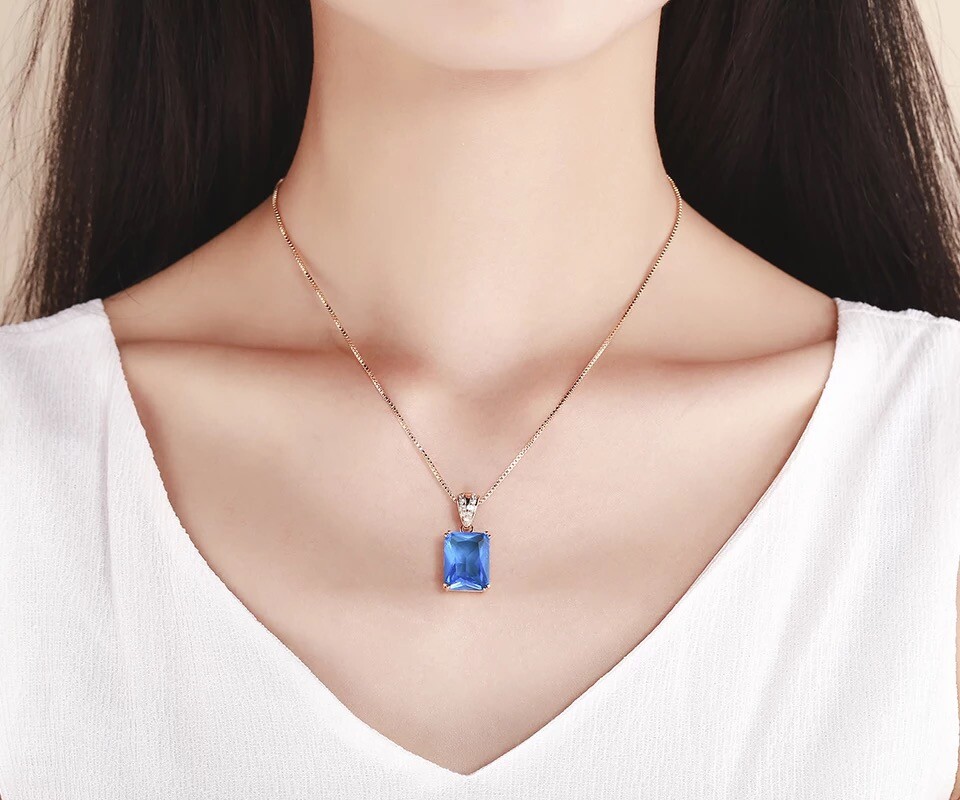 ZARD Emerald-Cut Rectangle Blue Cubic Zirconia Pendant Necklaces in Gold Tone