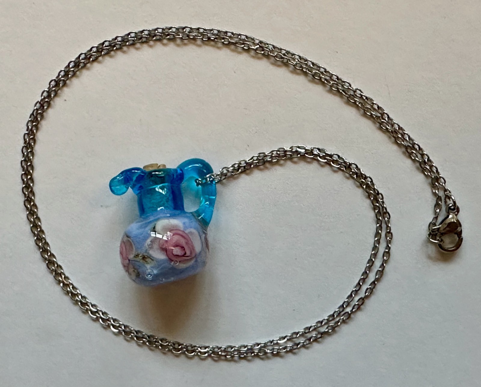 Vase Urn with handle blue glass with flower & cork pendant 1″ necklace 24″ steel