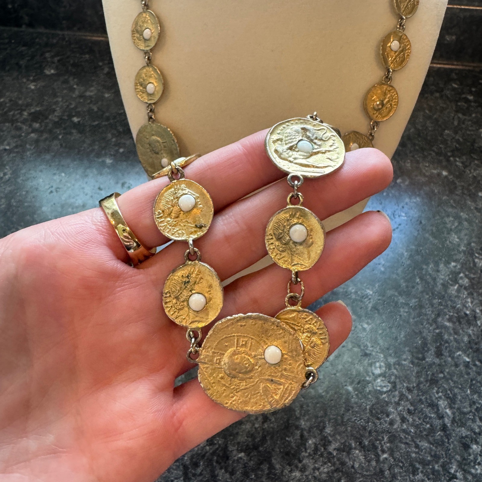 Vintage 80s Pauline Rader Gold Greek/Roman Coin Necklace White Cabochon Hammered