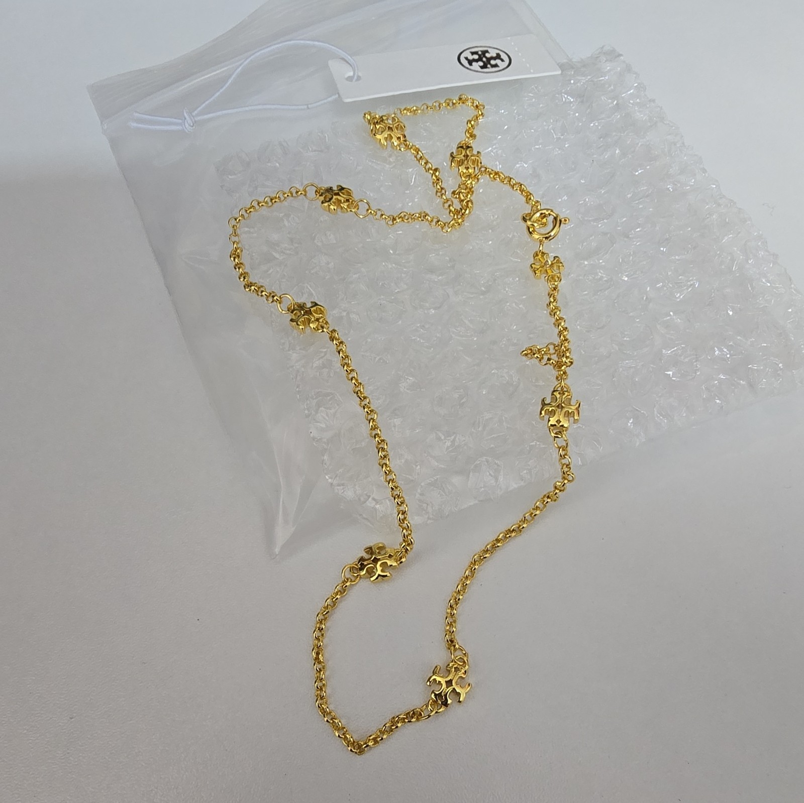 Tory Burch Gold Tone Logo Station Necklace Cable Chain Spring Ring Closure