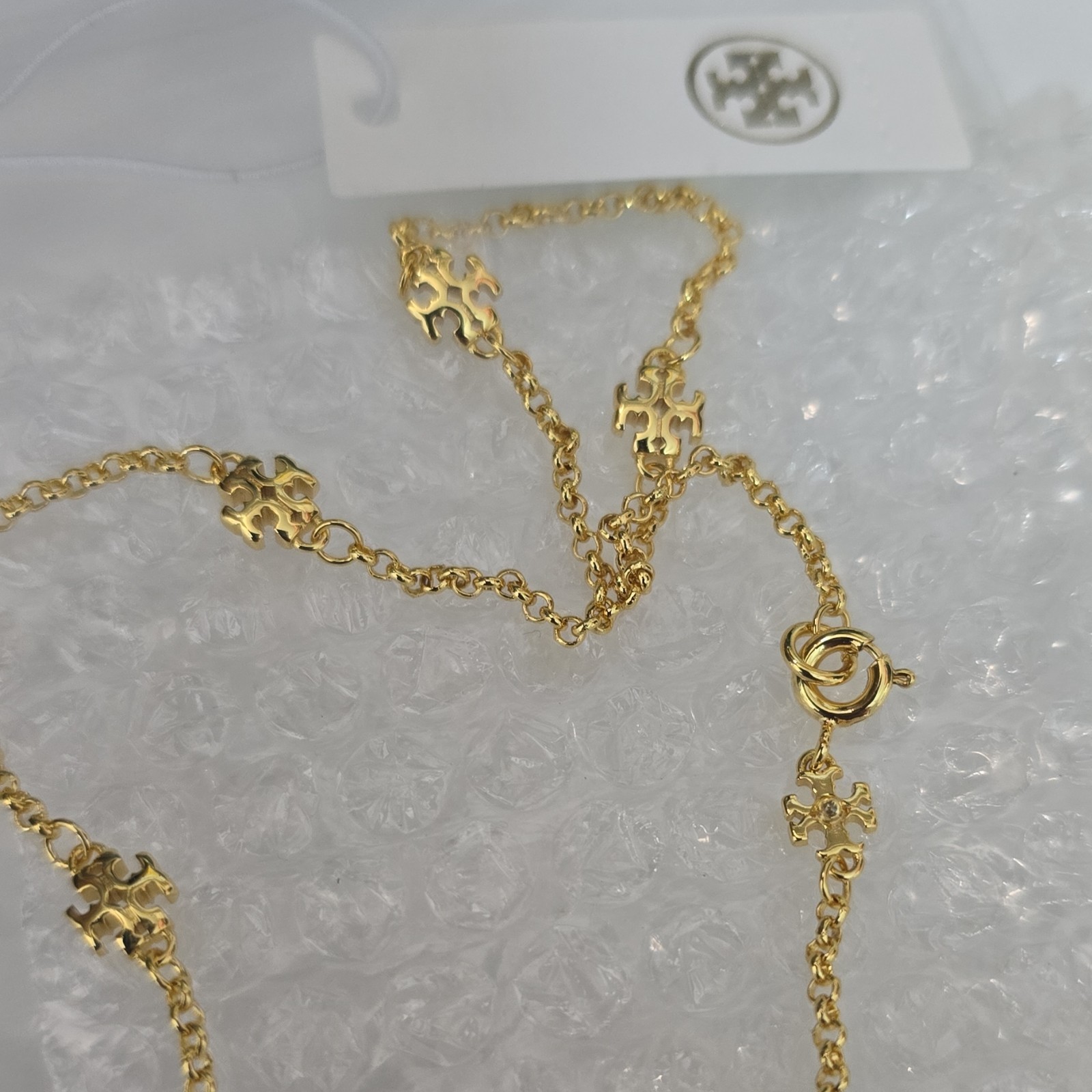 Tory Burch Gold Tone Logo Station Necklace Cable Chain Spring Ring Closure