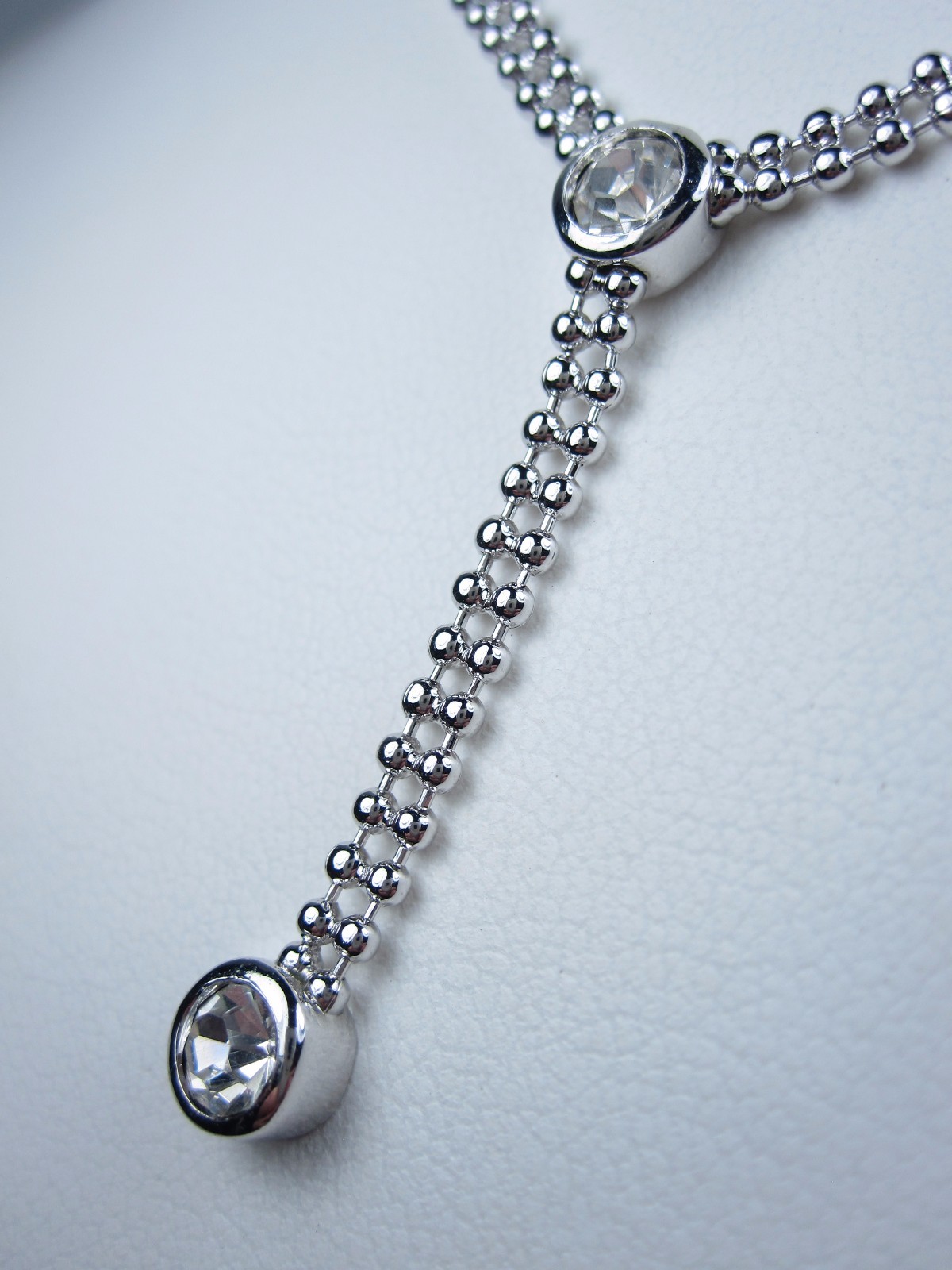 Nina Ricci Rhodium Plated Necklace with Swarovski Crystals – 14-16″ length 0589