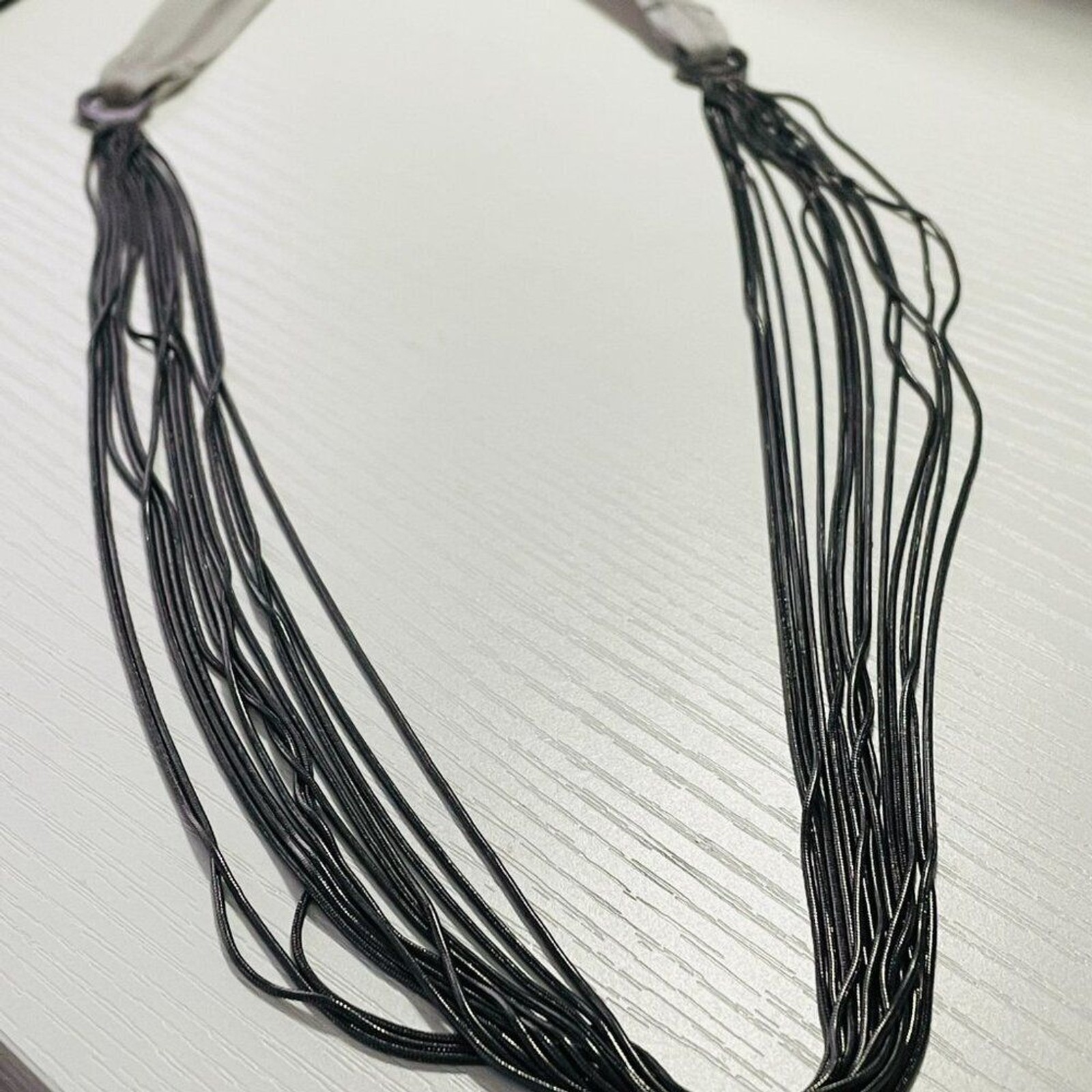 High Carbon Steel Piano Wire 14-Strand Necklace Gray Ribbon