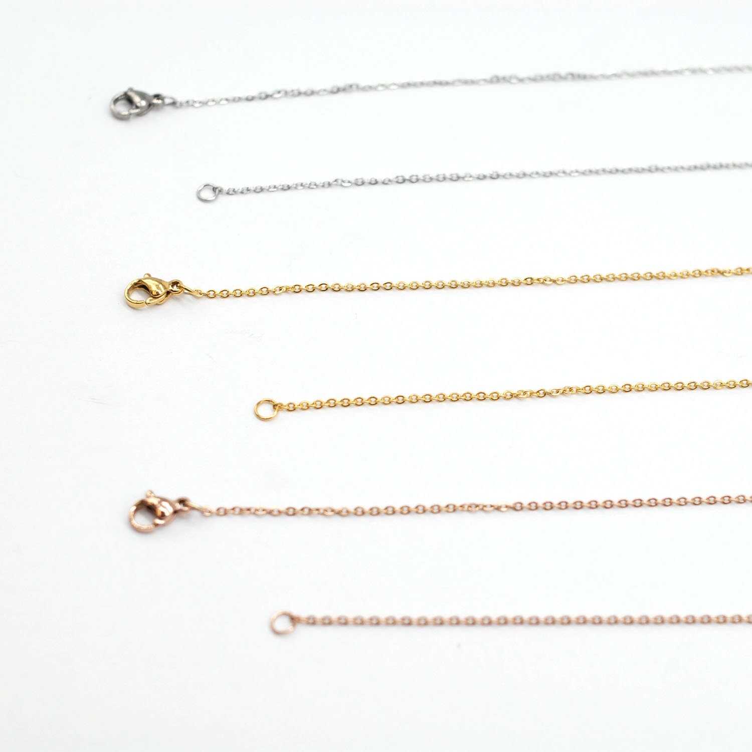 9PCS Stainless Steel Silver Tone Flat Cable Necklace 16″/18″/20″/22″ Wide 1.5mm