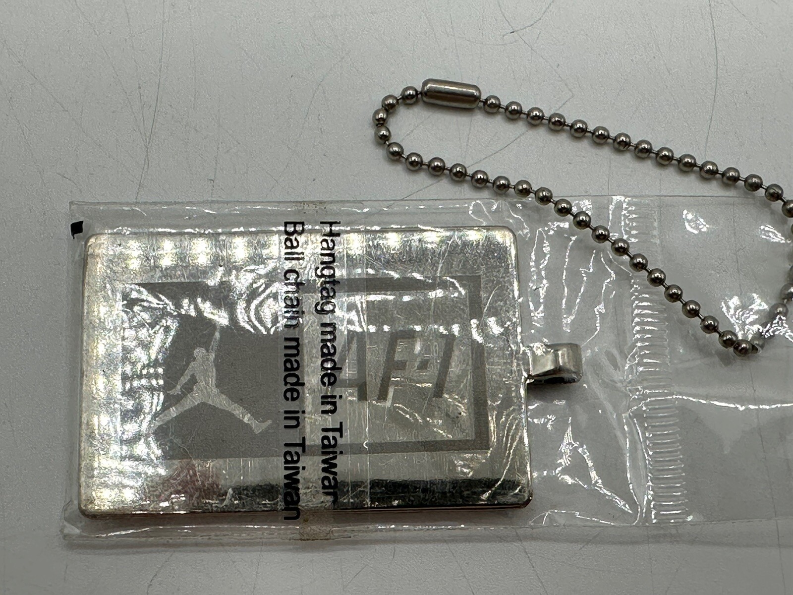 AF-1 Michael Jordan Nike Pendant, Dog Tag, Keychain Metal & White Jump Man Logo