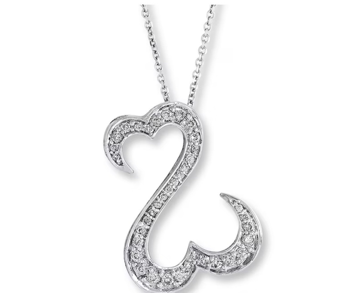 JAme Seymore open heart white gold chain and pendant 1/4 carat diamond
