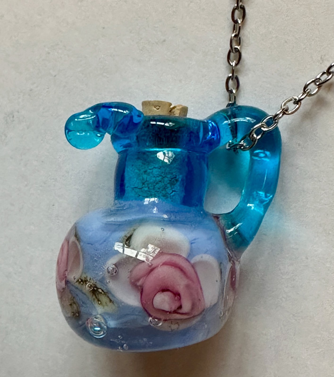 Vase Urn with handle blue glass with flower & cork pendant 1″ necklace 24″ steel