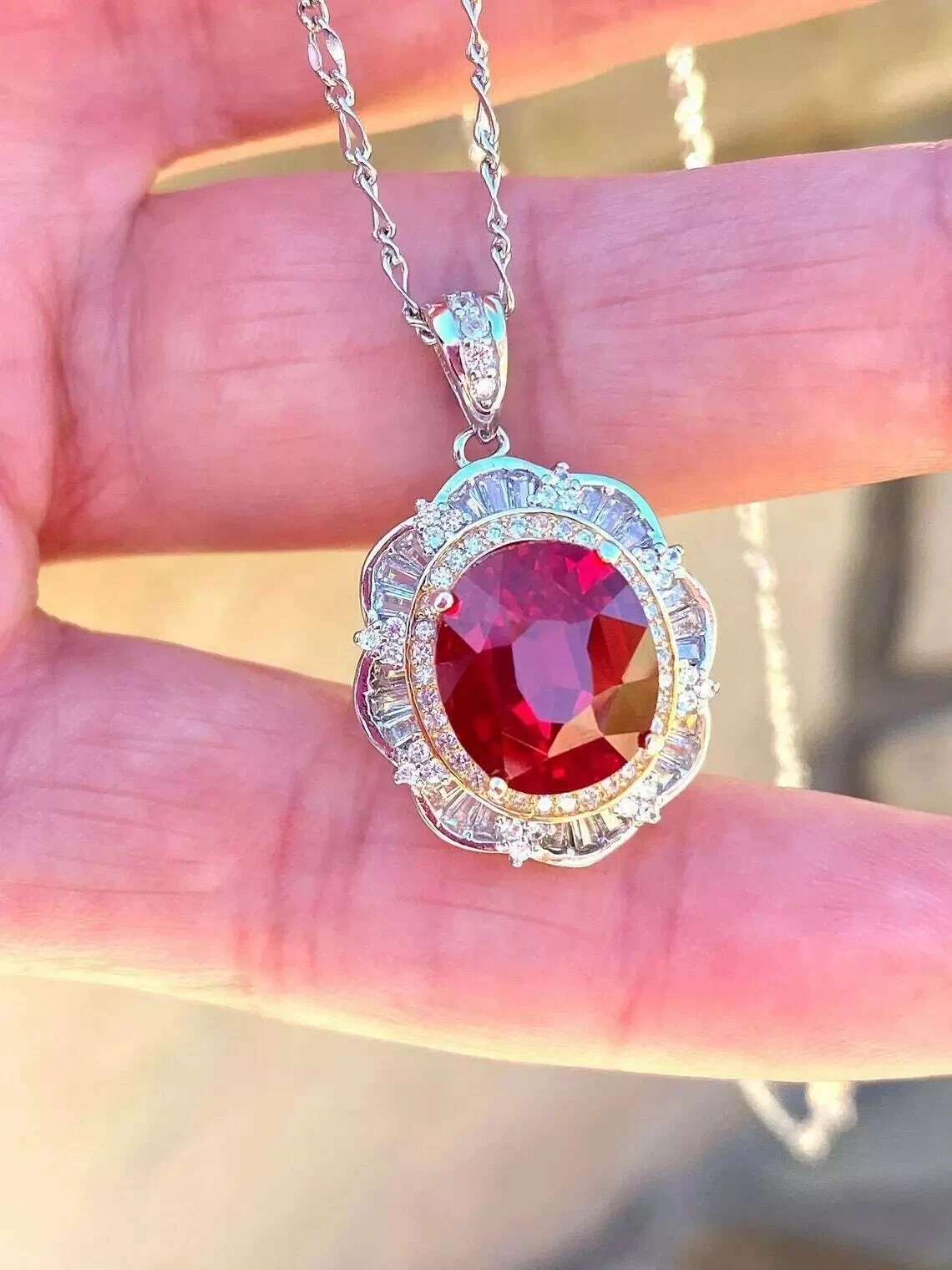 3Ct Oval Cut Simulated Red Ruby Halo Pendant With Chain In 14k White Gold Plated