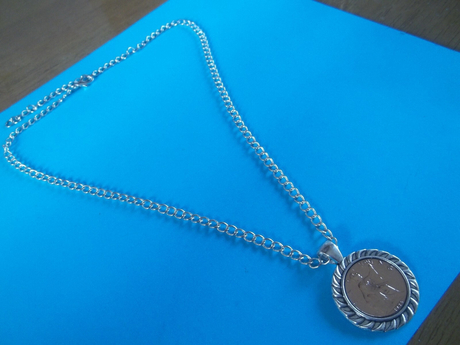 BRITANNIA FARTHING – LIMITED EDITION – SILVER CASED CURB NECKLACE – 1911 to 1936
