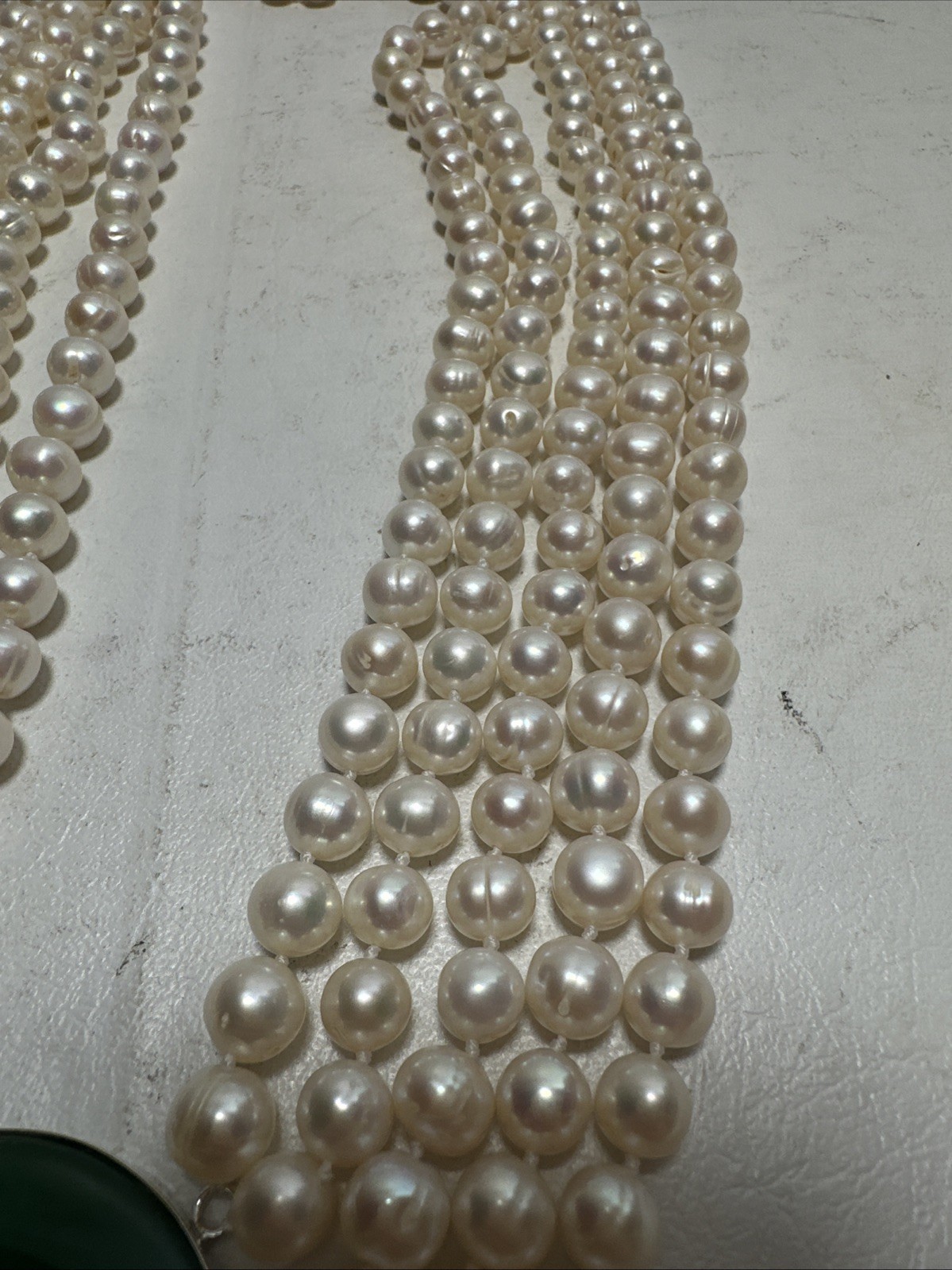 Chinese Natural Pearl Necklace, 925 Silver and a Green Stone In The Middle