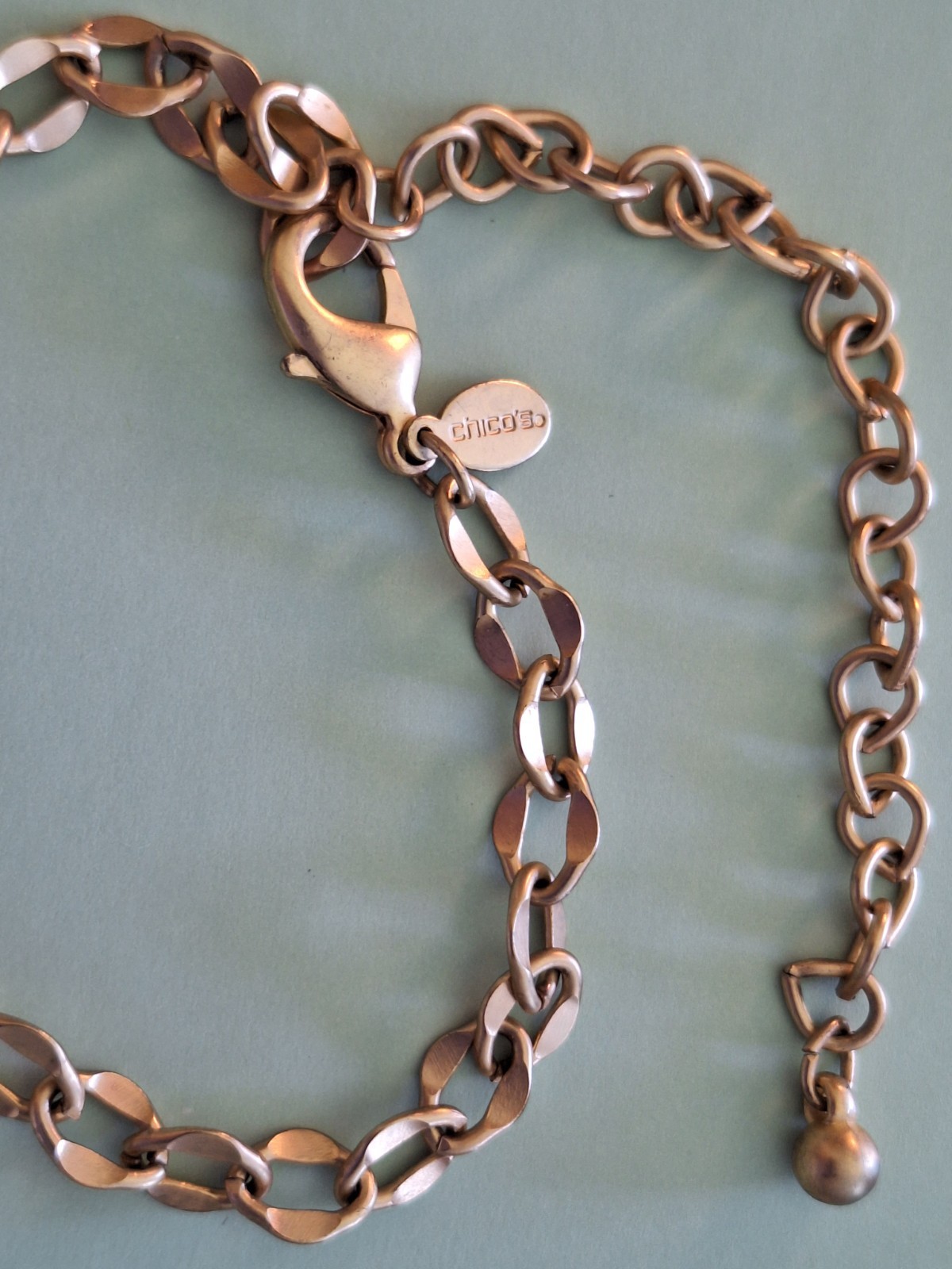 CHICO’S 18 INCH LONG GOLD COLORED BALLS AND COLORLESS STONE STATEMENT NECKLACE