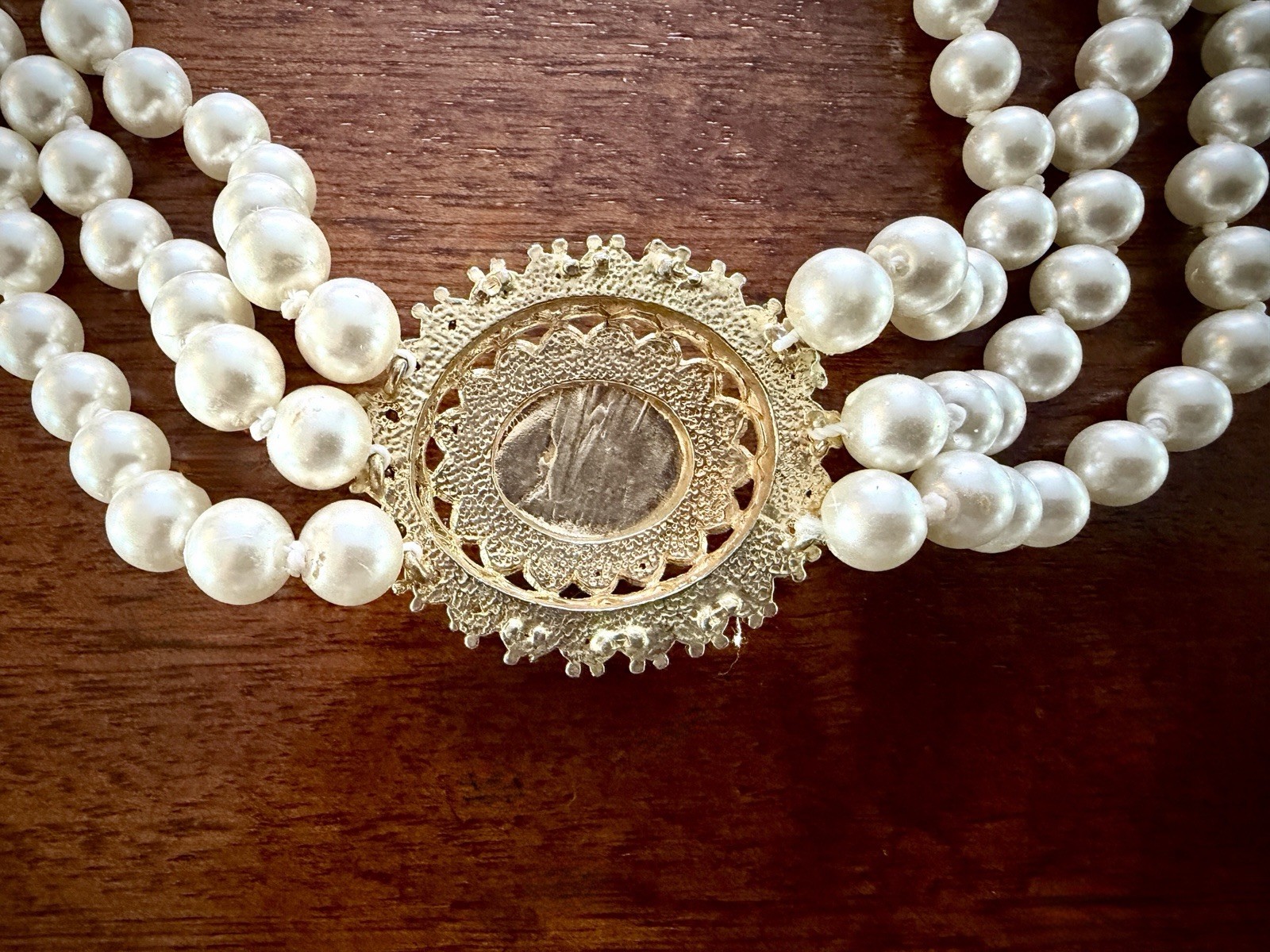 Vintage Triple‑Strand Faux Pearl Necklace w/ Ornate Oval Crystal Clasp – Classic