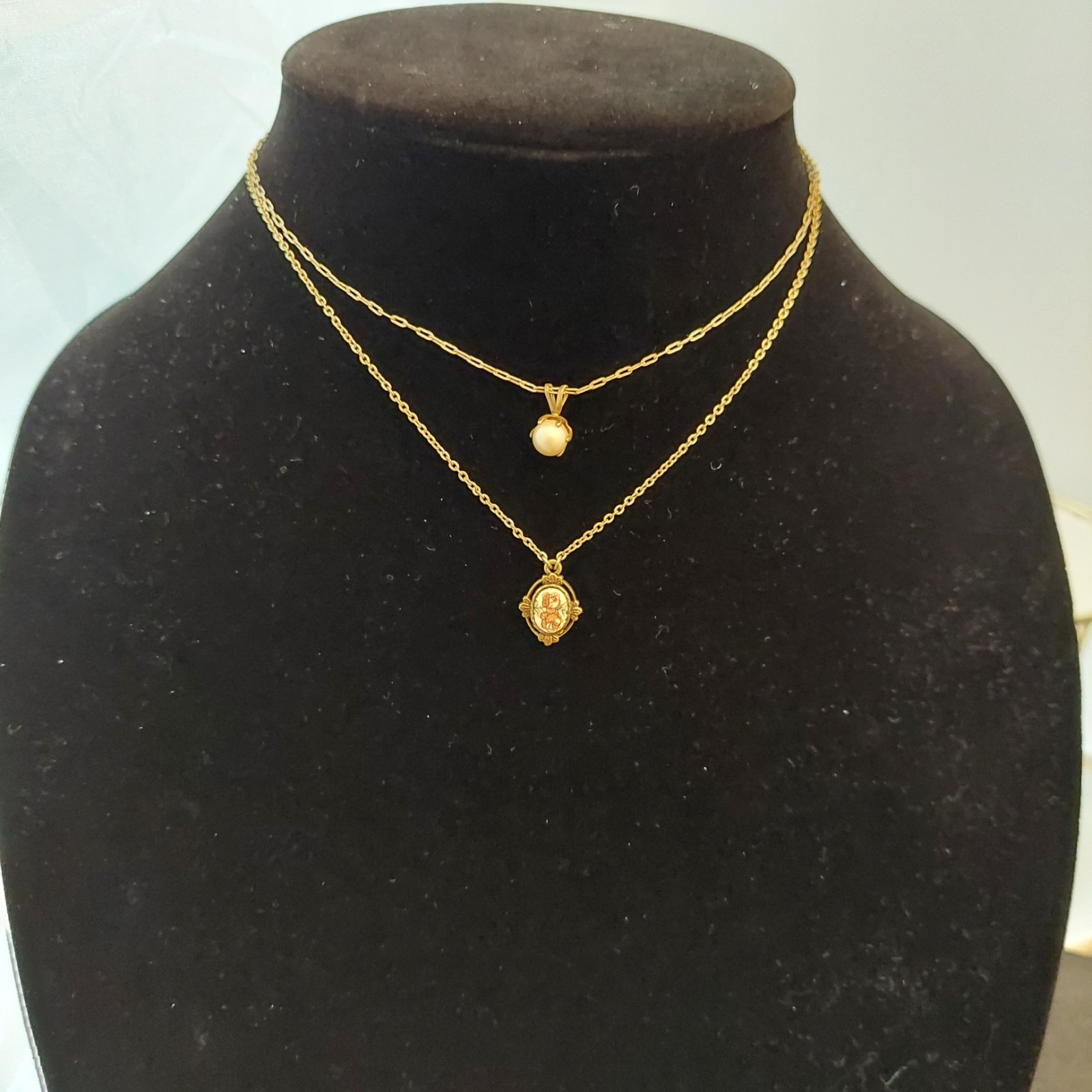 5 Gorgeous 1928 Brand Delicate Gold Tone Necklaces with various charms/looks