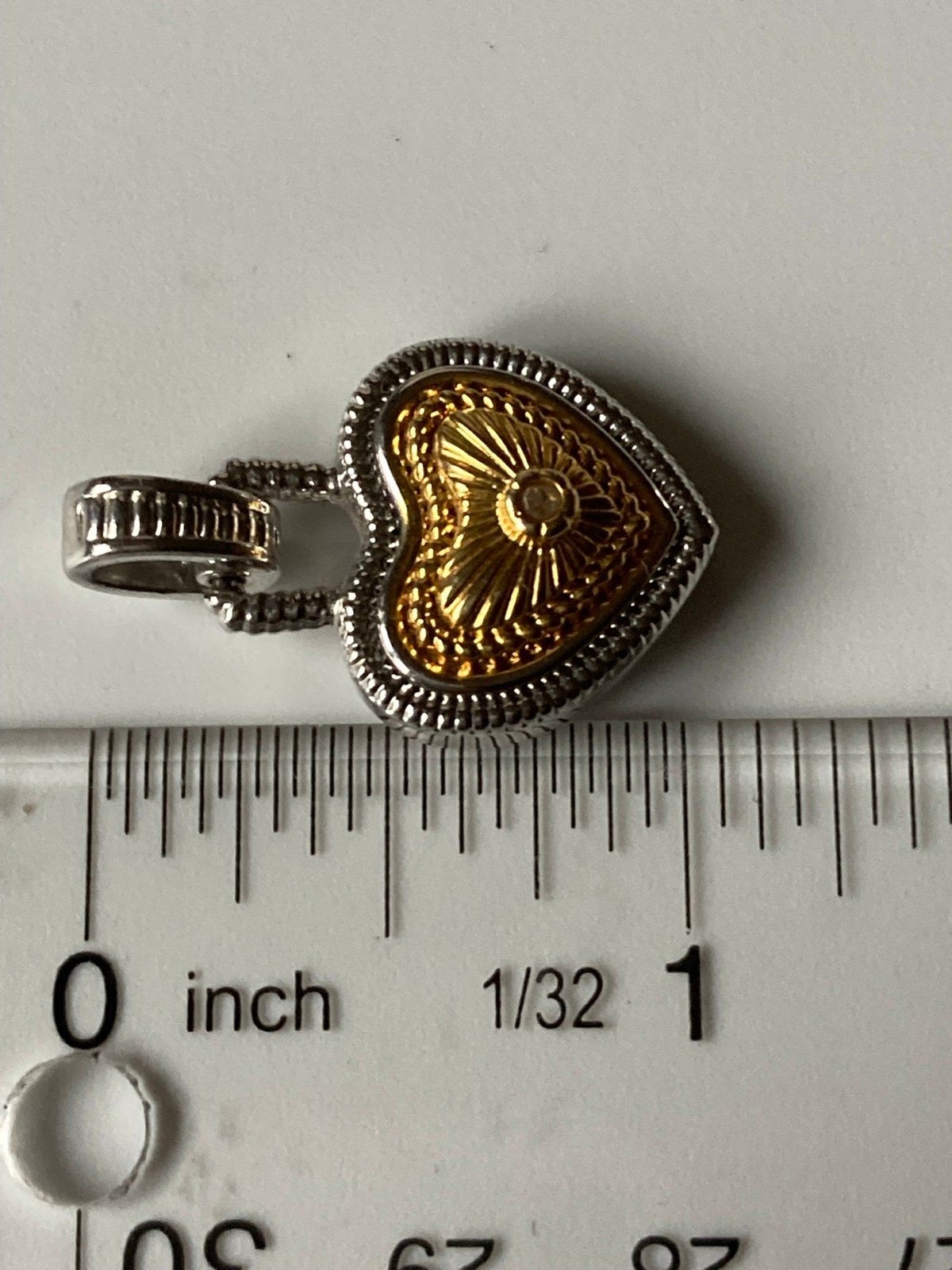 Rhodium plated genuine diamond heart pendant