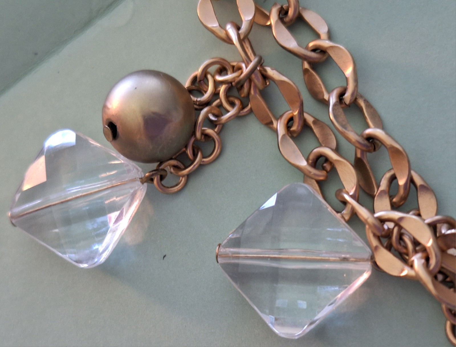 CHICO’S 18 INCH LONG GOLD COLORED BALLS AND COLORLESS STONE STATEMENT NECKLACE