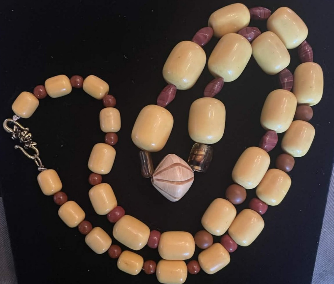 Yellow and Brown Beaded Necklace with Carved Wooden Pendant. 30 in. Gift box