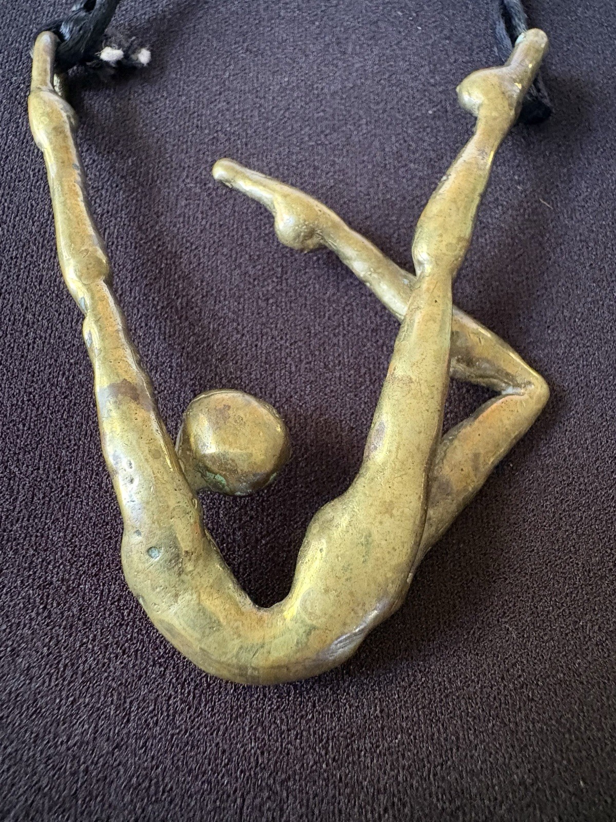 VINTAGE BRASS NUDE DANCER ACROBAT PENDANT ARTISAN BRUTALIST ROPE NECKLACE