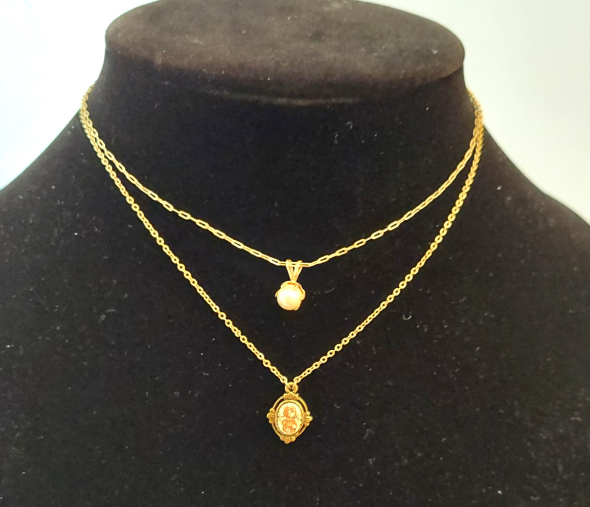 5 Gorgeous 1928 Brand Delicate Gold Tone Necklaces with various charms/looks
