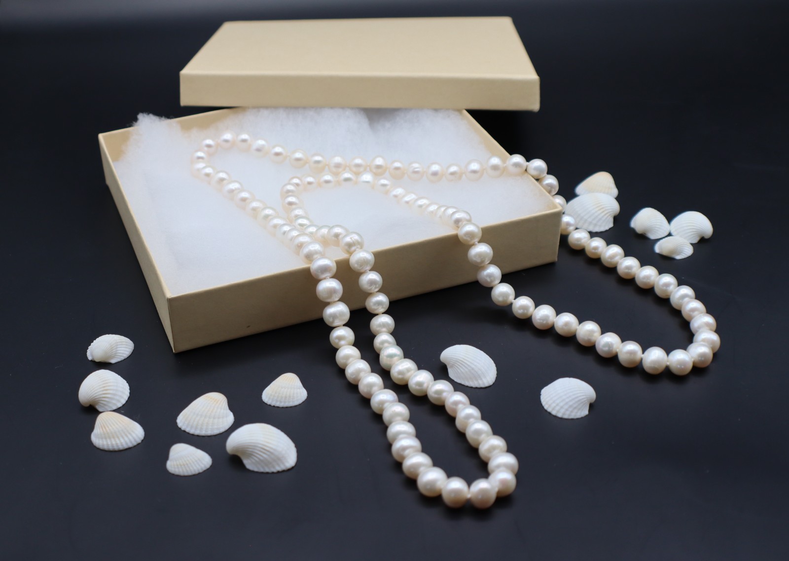 Beautiful Knotted 7-8mm Oval White Cultured Freshwater Pearl Necklace – App 35″