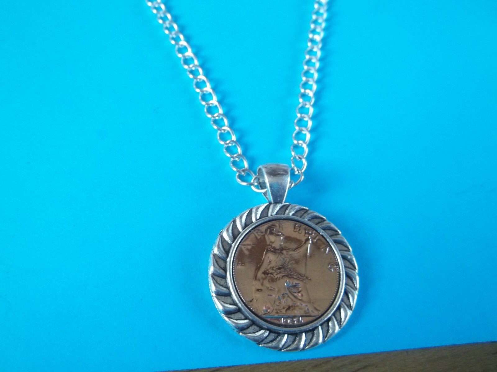 BRITANNIA FARTHING – LIMITED EDITION – SILVER CASED CURB NECKLACE – 1911 to 1936