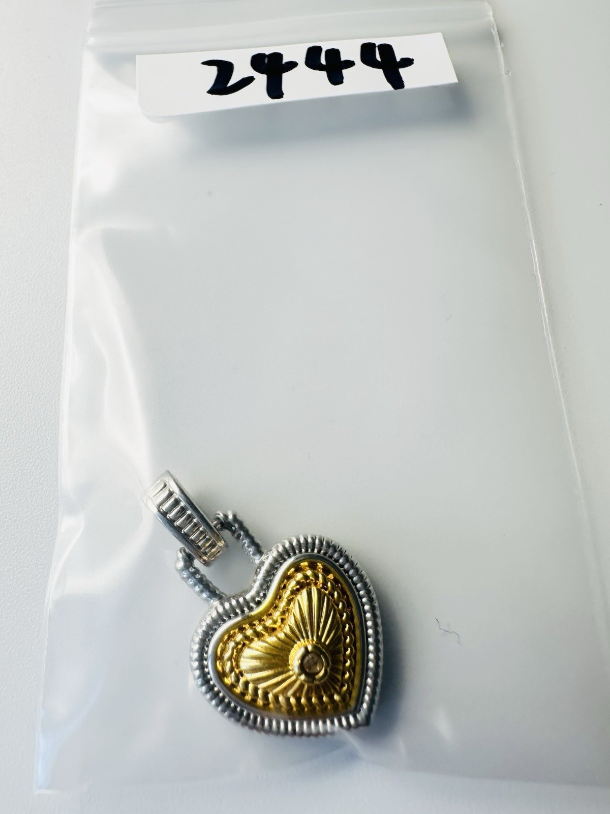 Rhodium plated genuine diamond heart pendant