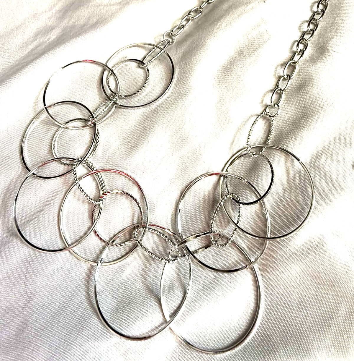 NEW Silver Tone Hoop Necklace Multiple Layers Interconnected Variated Circles