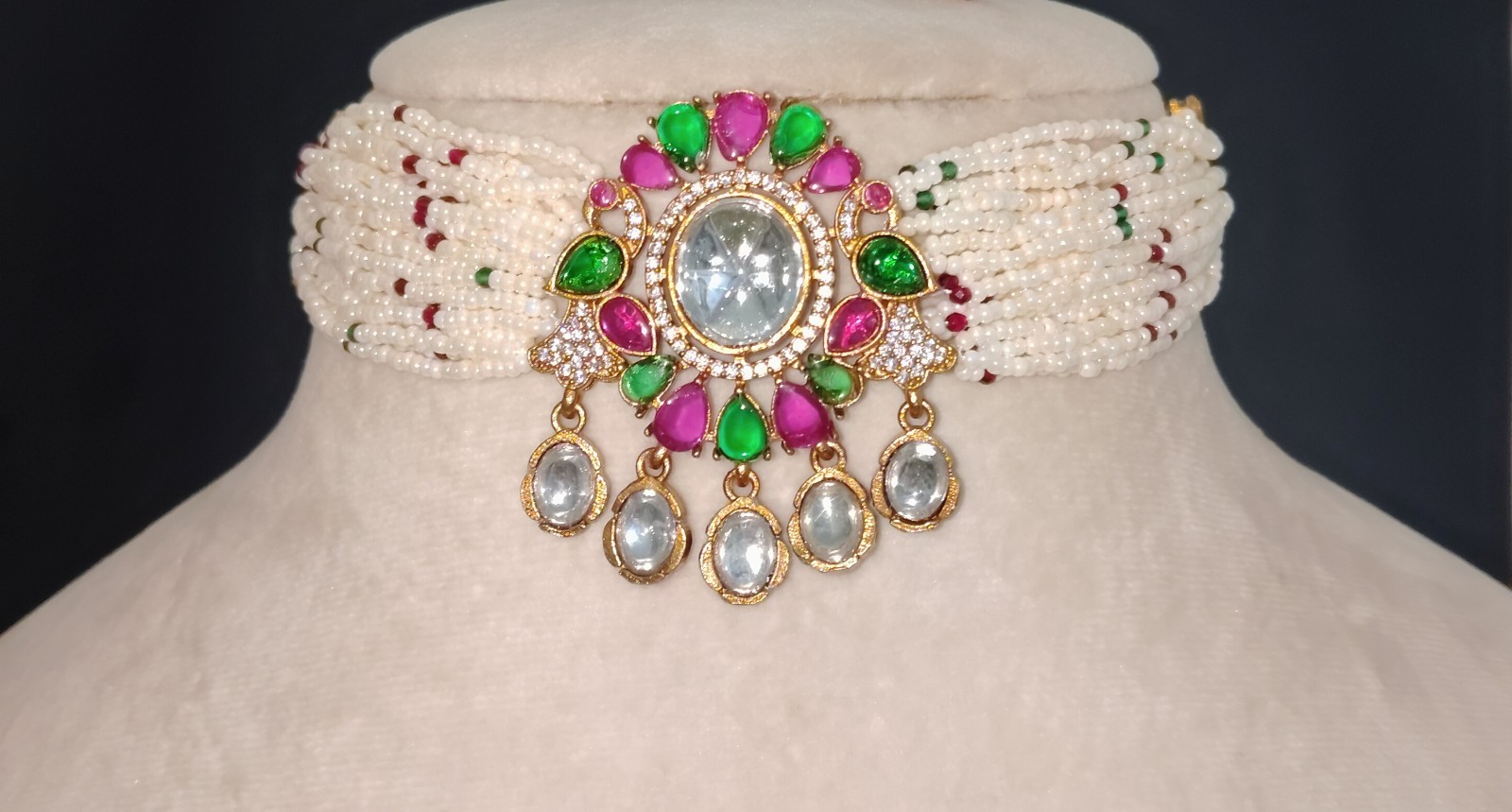 Dana Emerald Ruby Studded Multi Strand Pearl Kundan Choker Set Roz Jewellers.