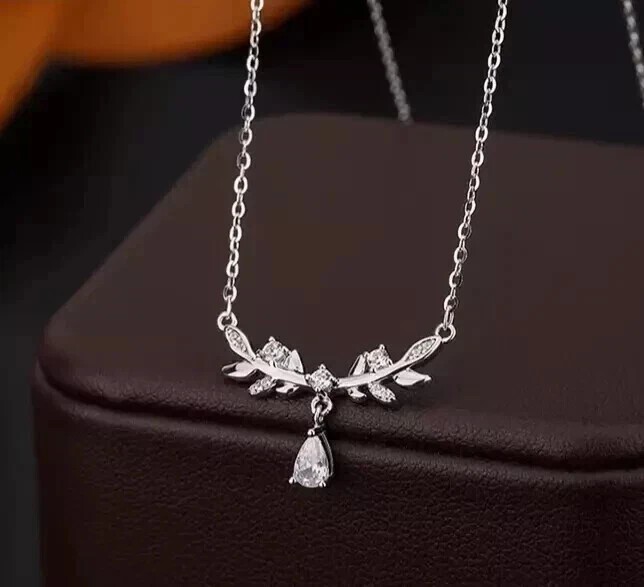 Gorgeous 2Ct Pear Cut Simulated Diamond Charm Necklace In 14K White Gold Plated