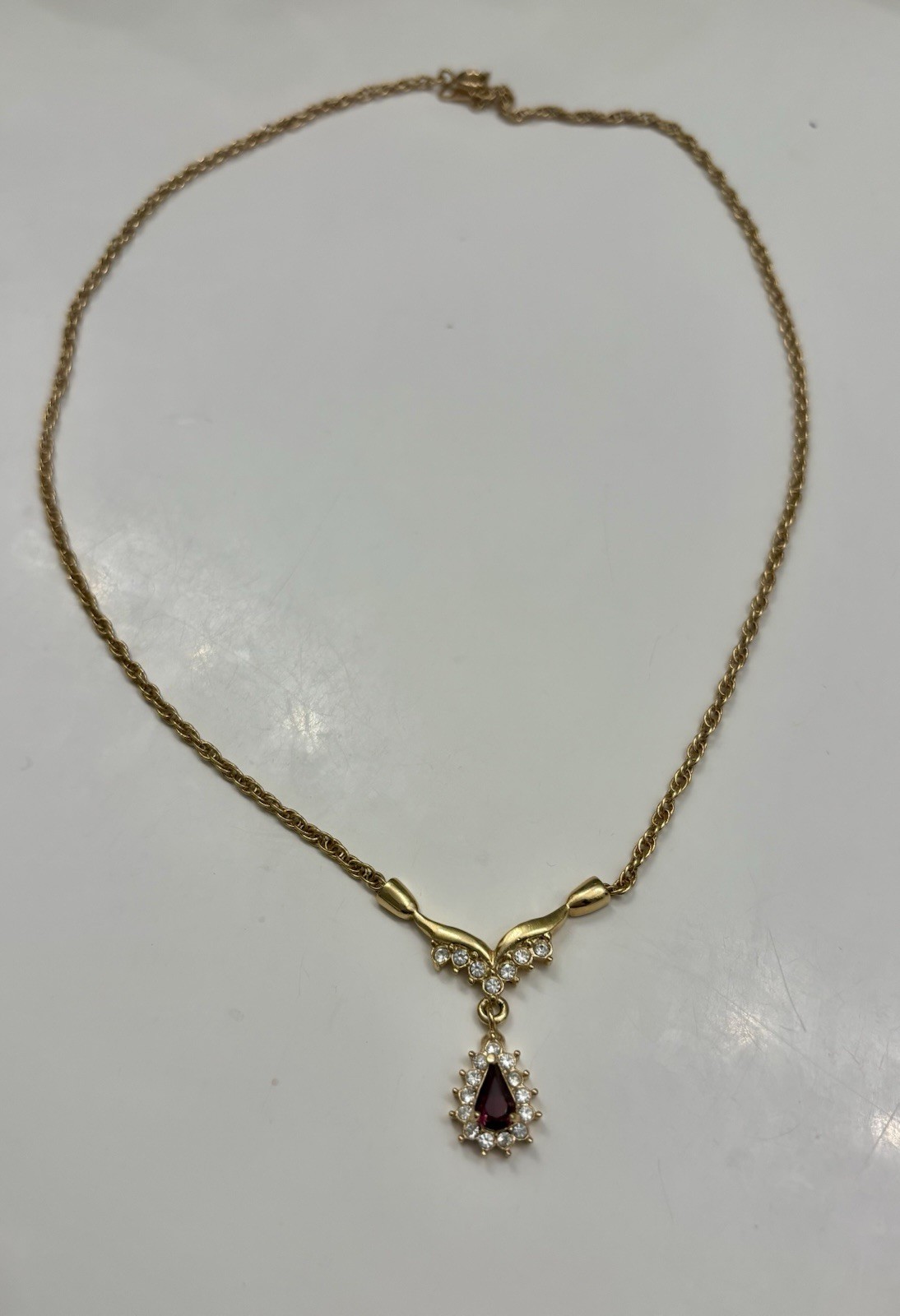 Roman 16 Inch Gold Colored Necklace With Faux Ruby Pendant