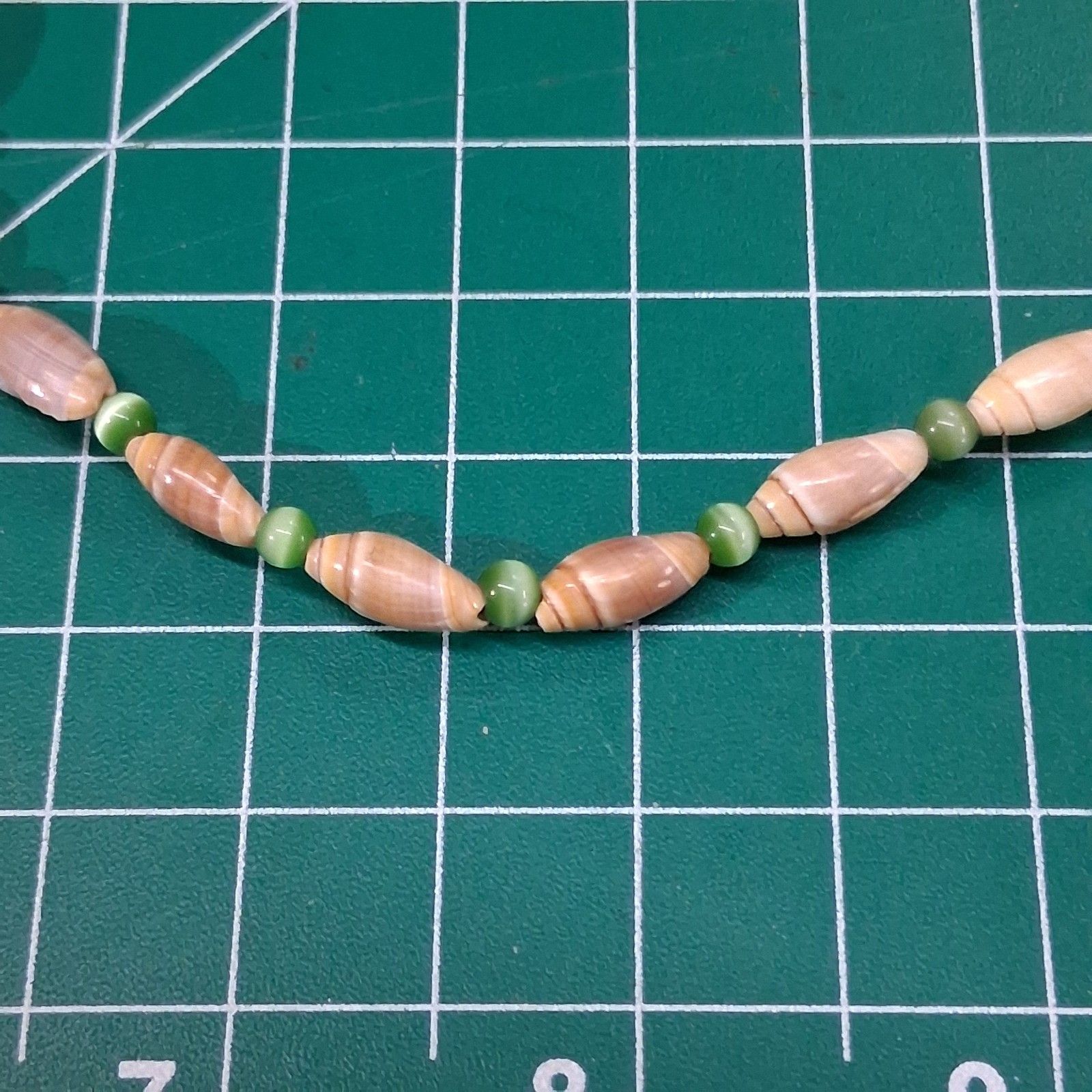 Vintage Tan Conch Sea Shell Green Glass Cats Eye Bead 16” Necklace