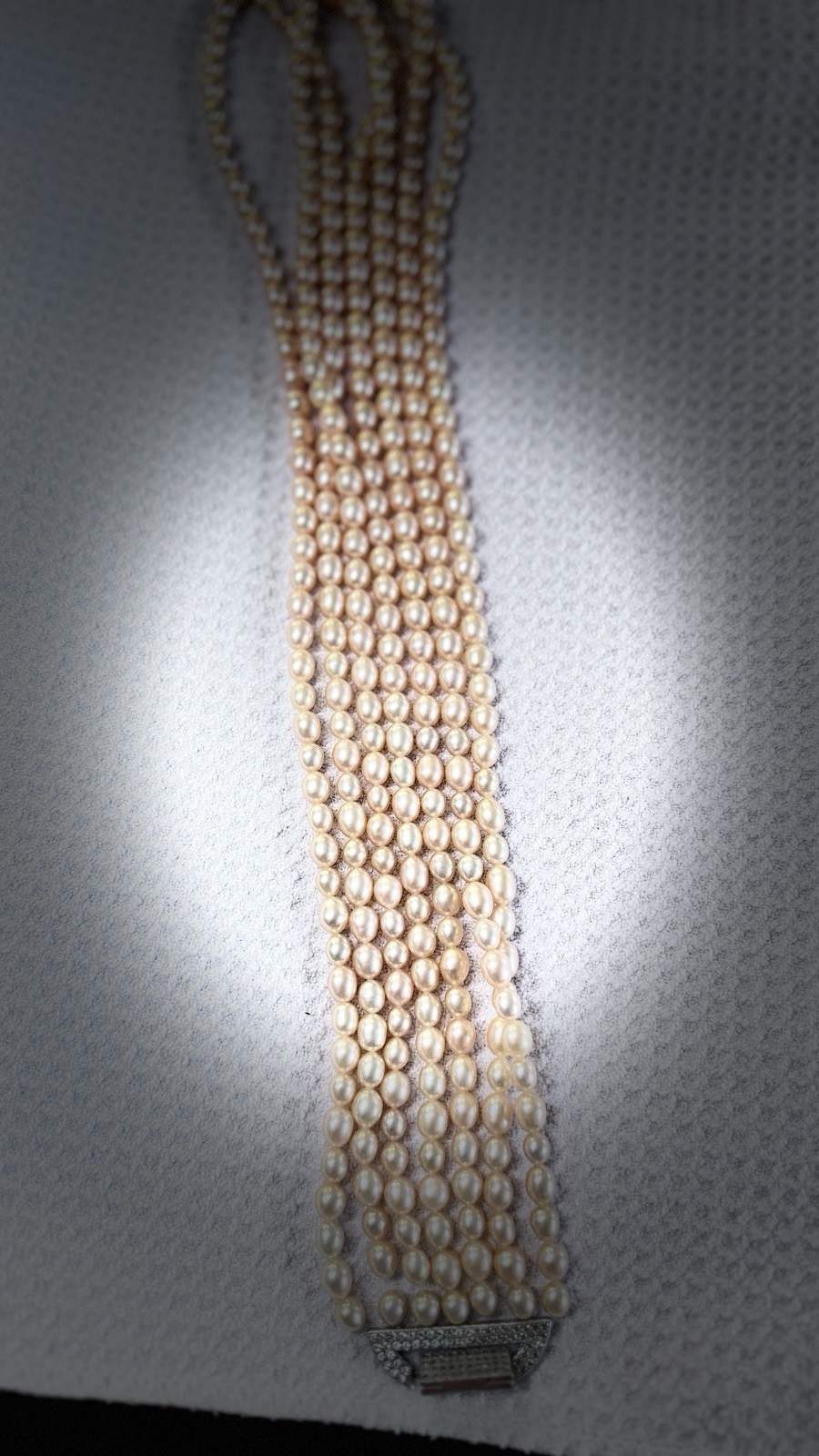 High-quality multi-strand freshwater pearls (6–7mm) with natural iridescent lust