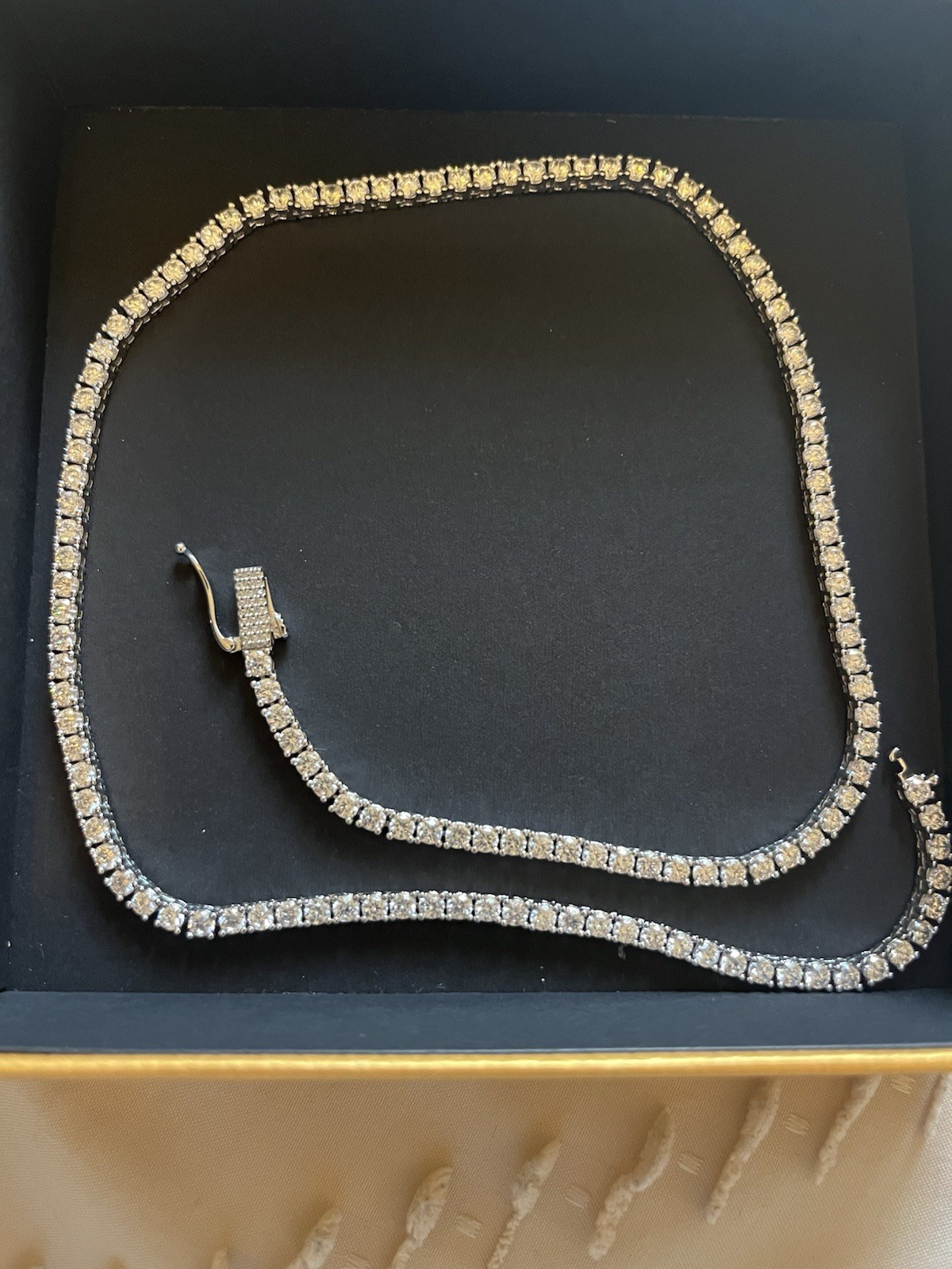 GLD Micro Tennis Chain, 18”, worn twice, excellent condition. Plated white gold