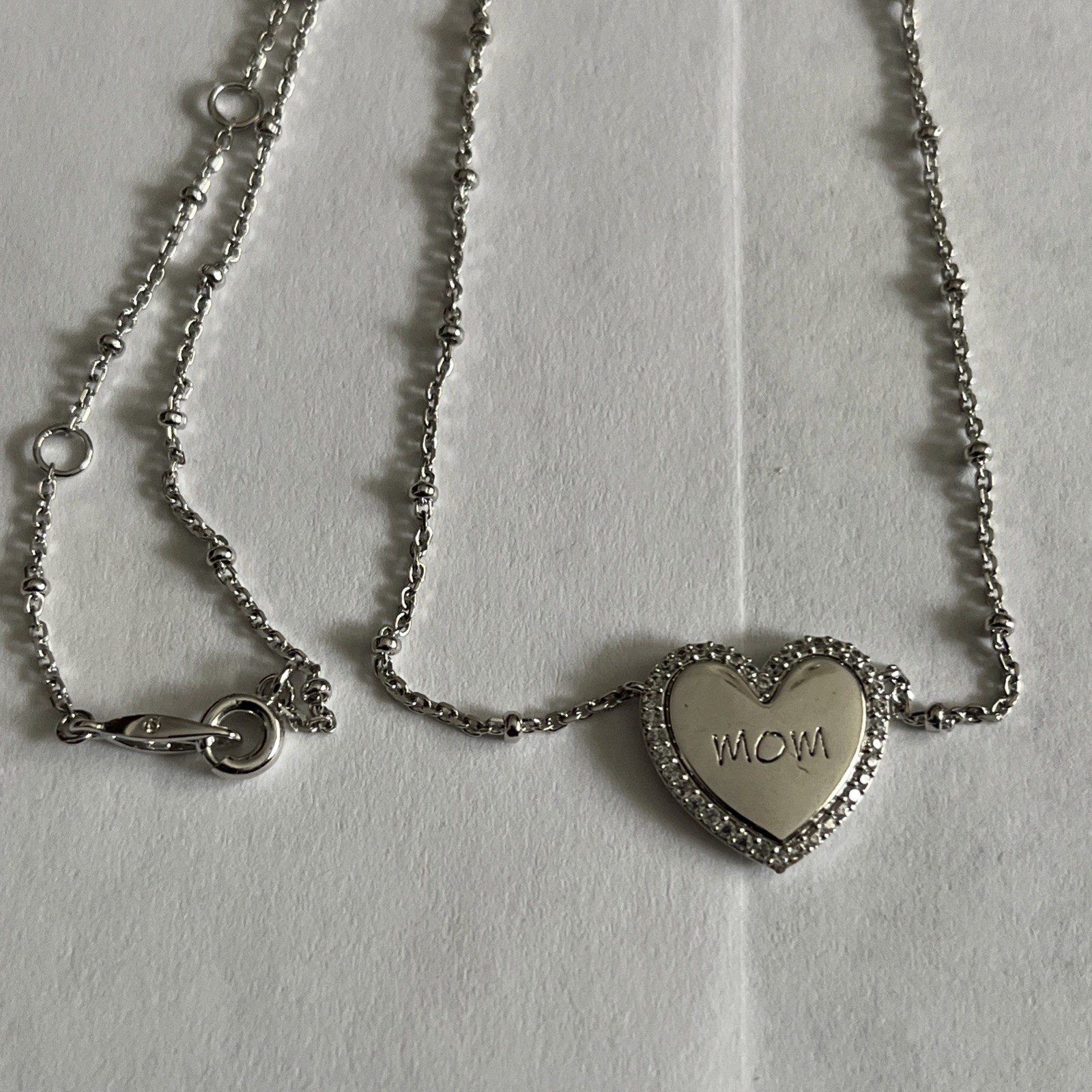 NadriLove Engraved Mom Heart Pendant Necklace in rhodium finish.