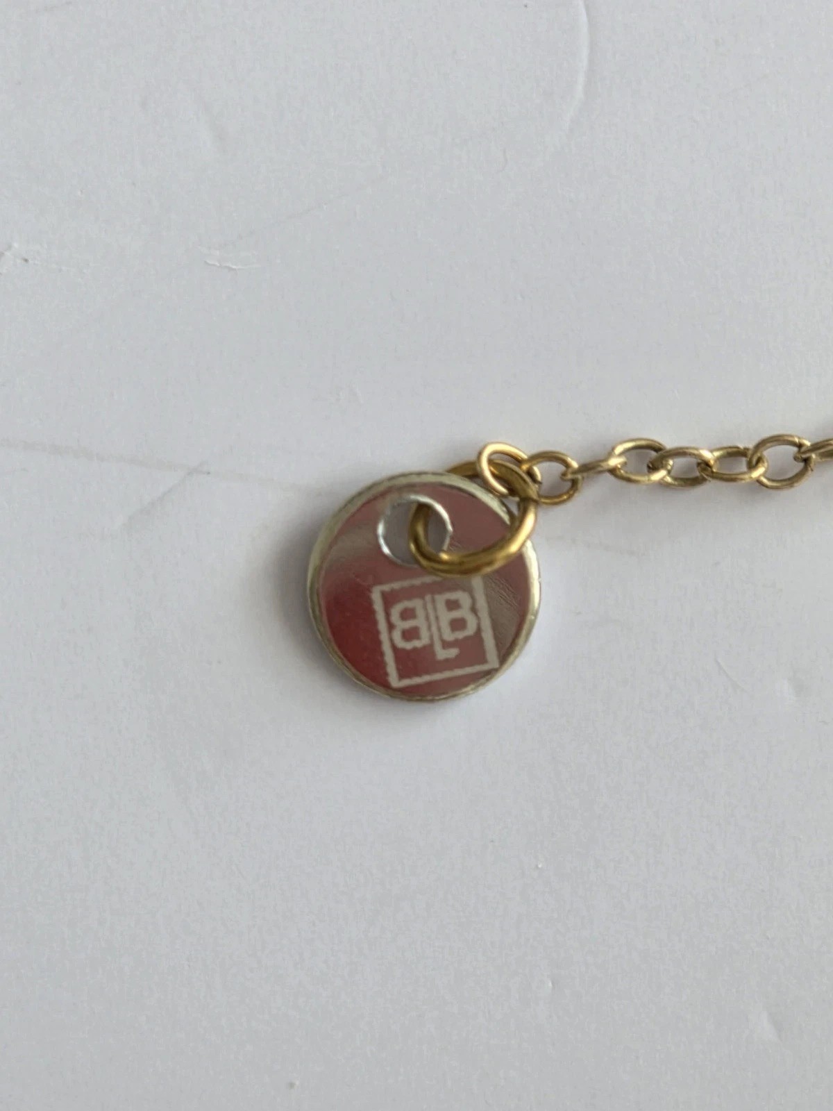 BLB Necklace With Black Cord, 6 Sided Pendant with Gold Tone-6.5 + 3 In Length