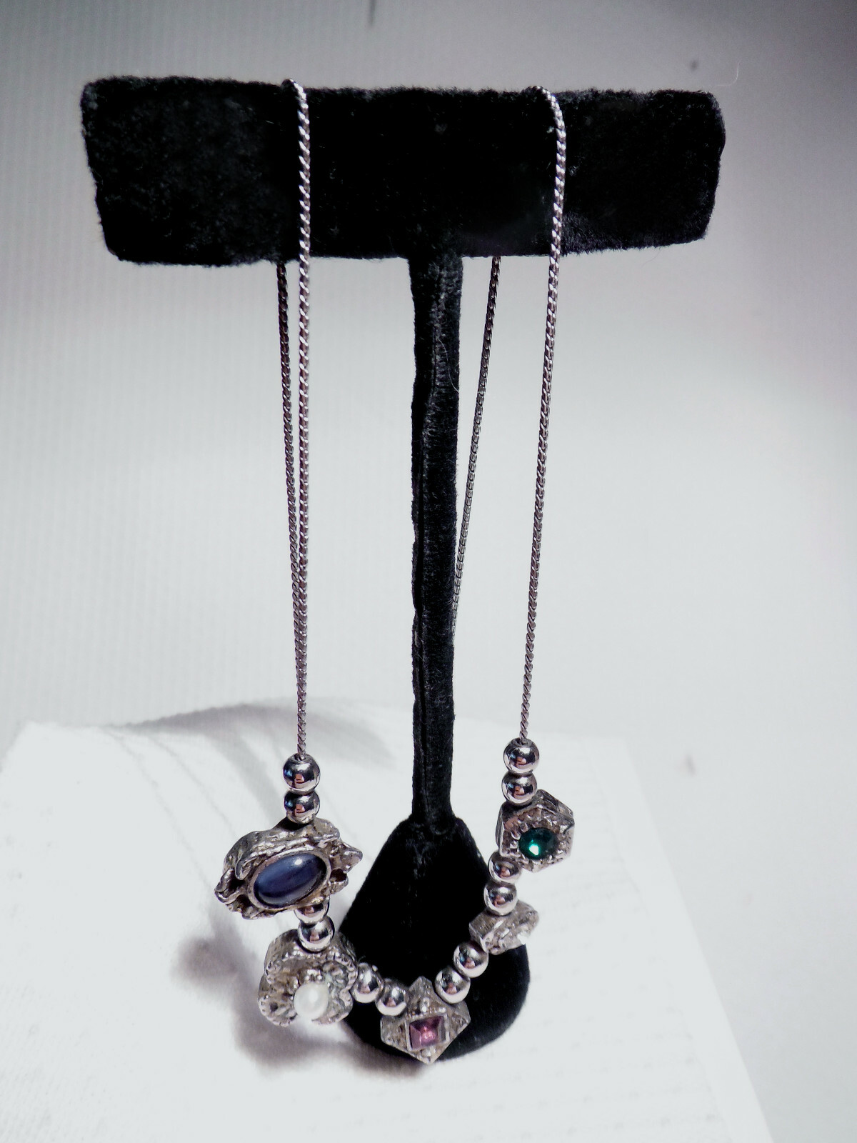 SILVER COLOR NECKLACE ~ VARIOUS COLORED STONES IN DIFFERENT SHAPES.