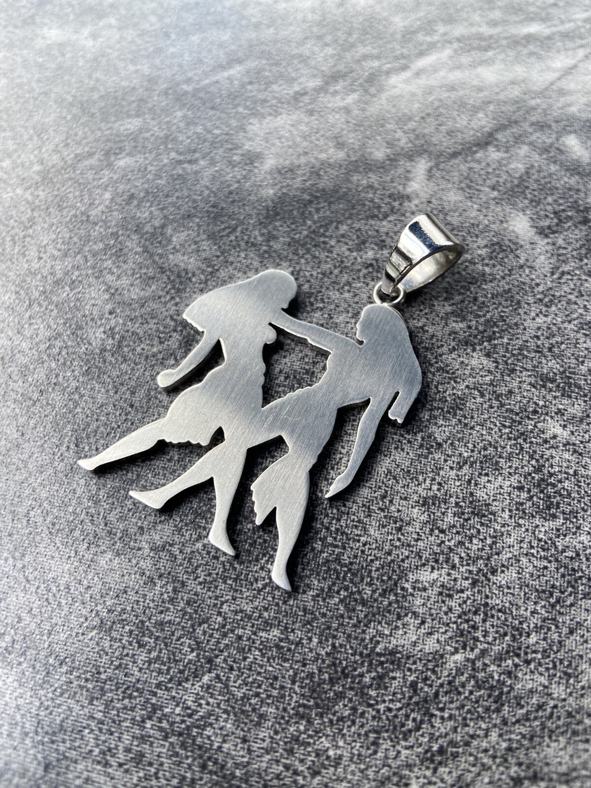 Amazon/tribe Relationship Female/Male Stainless Steel 1-1/2”x 1-3/4” Pendant.