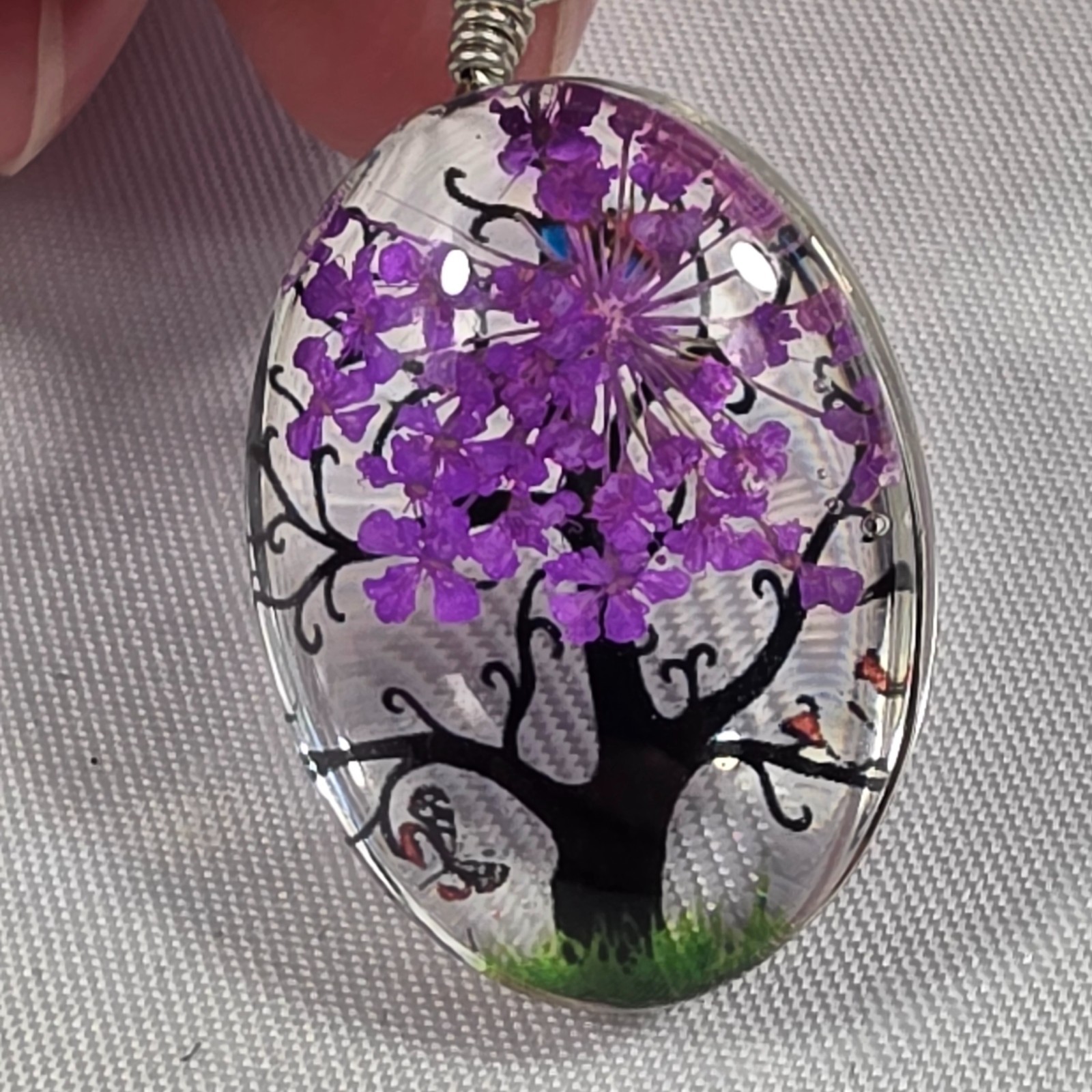 Tree of Life Resin Oval Pendant Dried Purple Flowers Butterflies, Tree & Grass