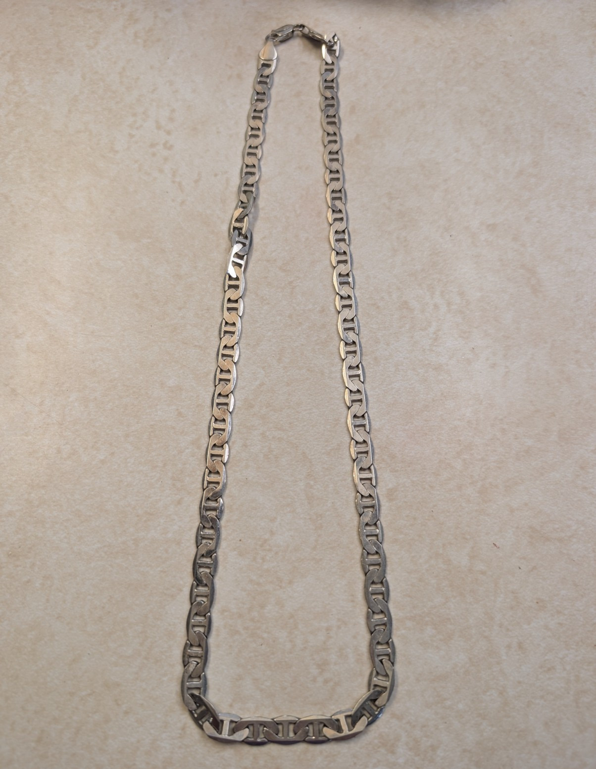 Flat Laying Silver Tone Stainless Steel Figaro Chain Necklace Lobster Clasp