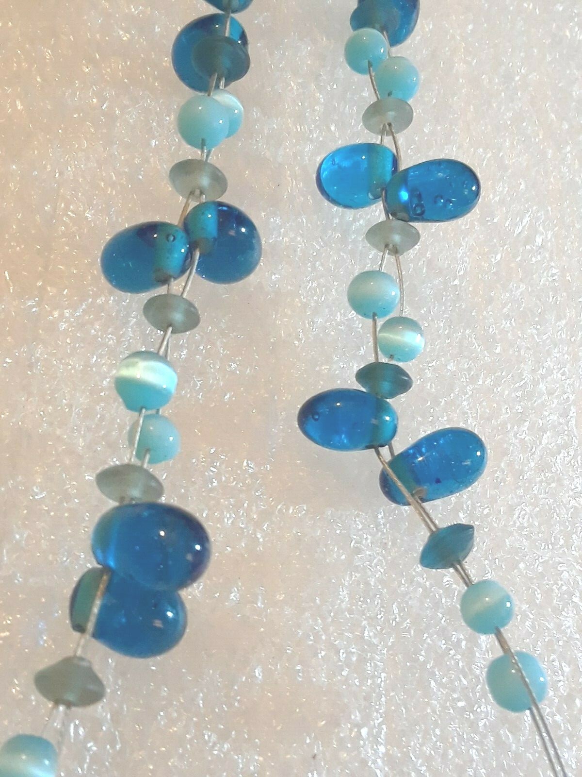 Beaded necklaces. Multi-color crystal beads, blue moon glow. You get all 5