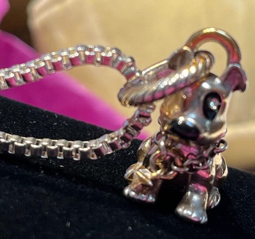 An Adorable Sterling Silver & Gold Puppy, Chain Patch on Eye & Crystal Eyes