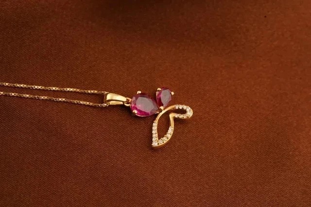 Pear Cut Simulated Pink Ruby Butterfly Shape Pendant In 14k Yellow Gold Plated