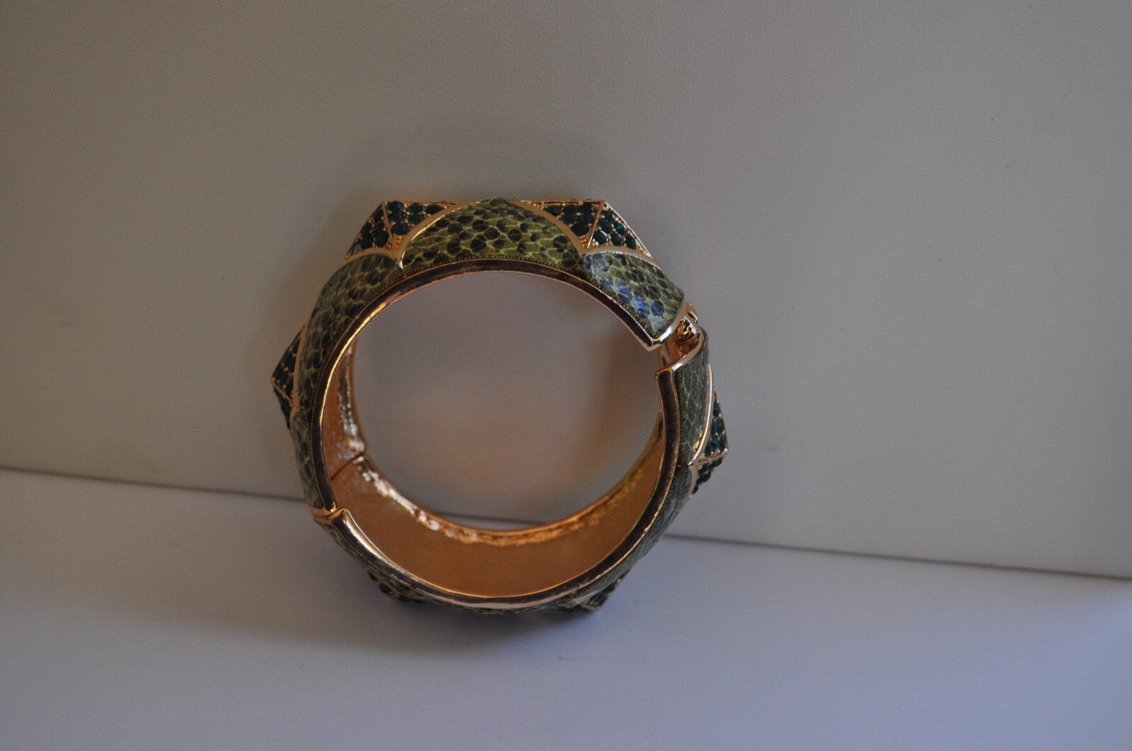 KIRKS FOLLY GREEN ENAMEL AND CRYSTAL CUFF BRACELET IN GOLD TONE