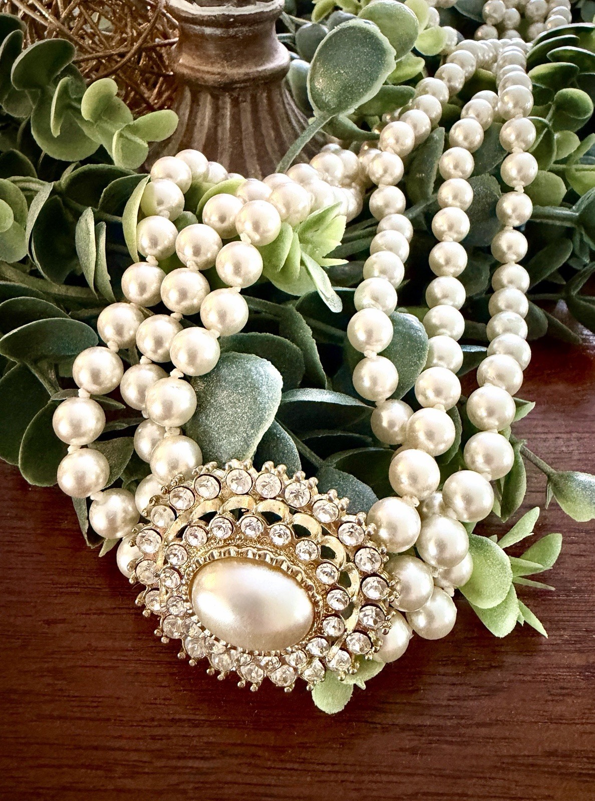 Vintage Triple‑Strand Faux Pearl Necklace w/ Ornate Oval Crystal Clasp – Classic
