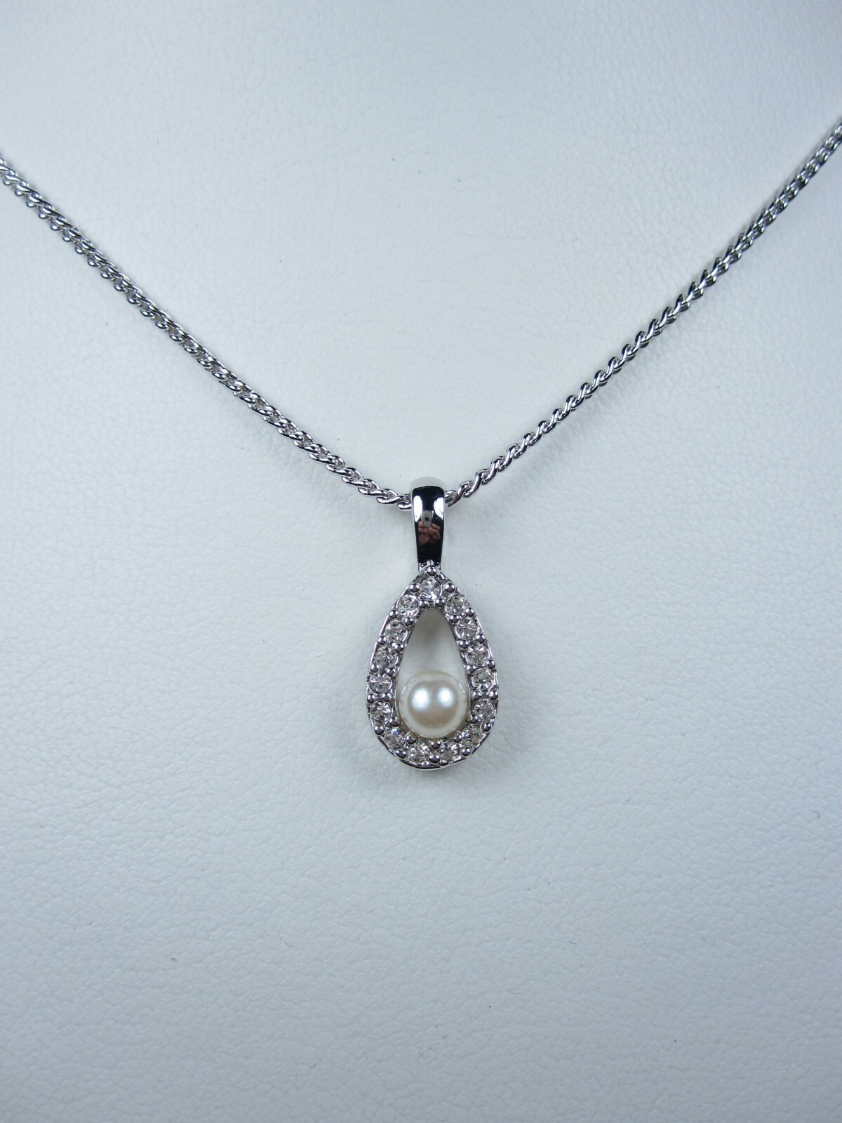 Nina Ricci Rhodium Plated Pendant with Swarovski Crystals & Pearls – 16-18″ 1761