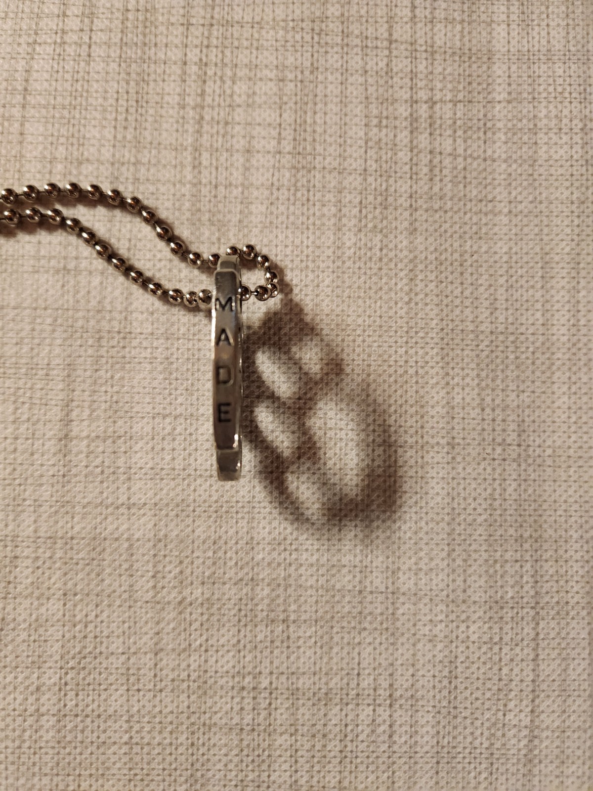 Good Charlotte Made Clothing Brass Knuckles Necklace