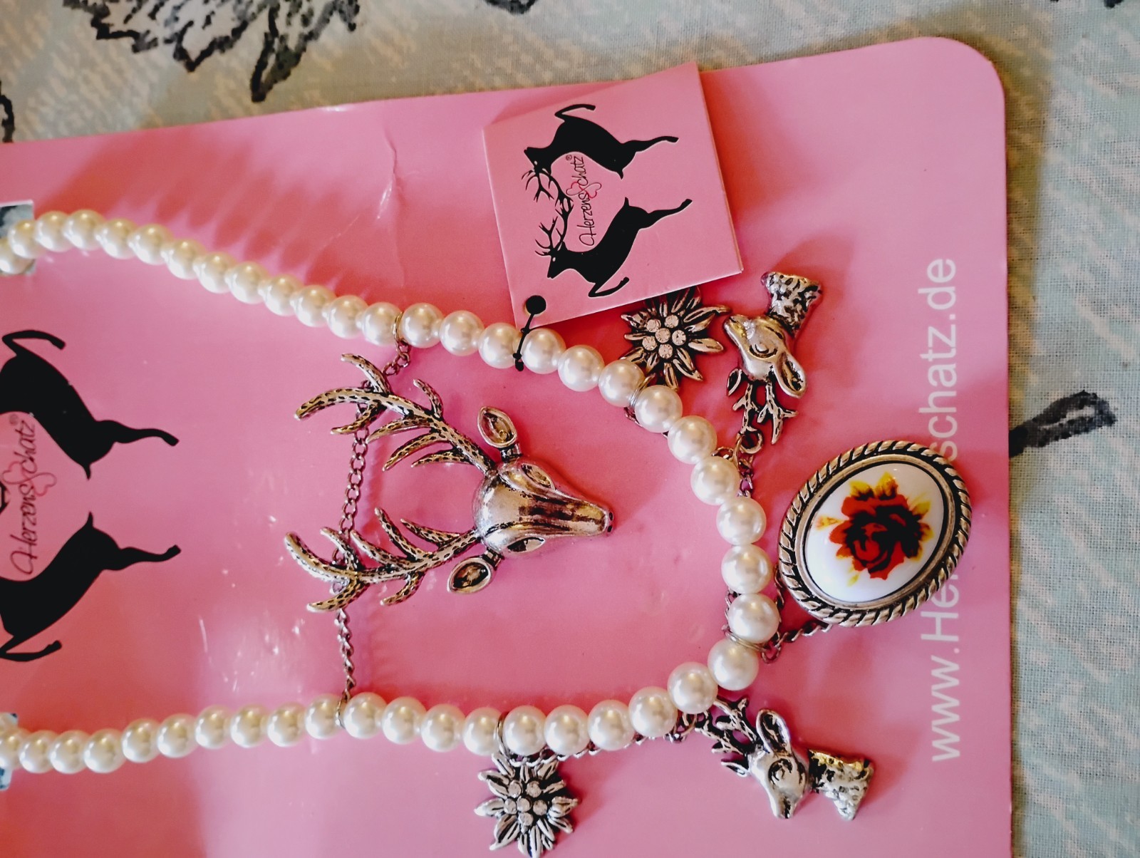 Fashion Jewelry.Germany, HERZENSSCHATZ Edelweiss, Deer charms with false pearls